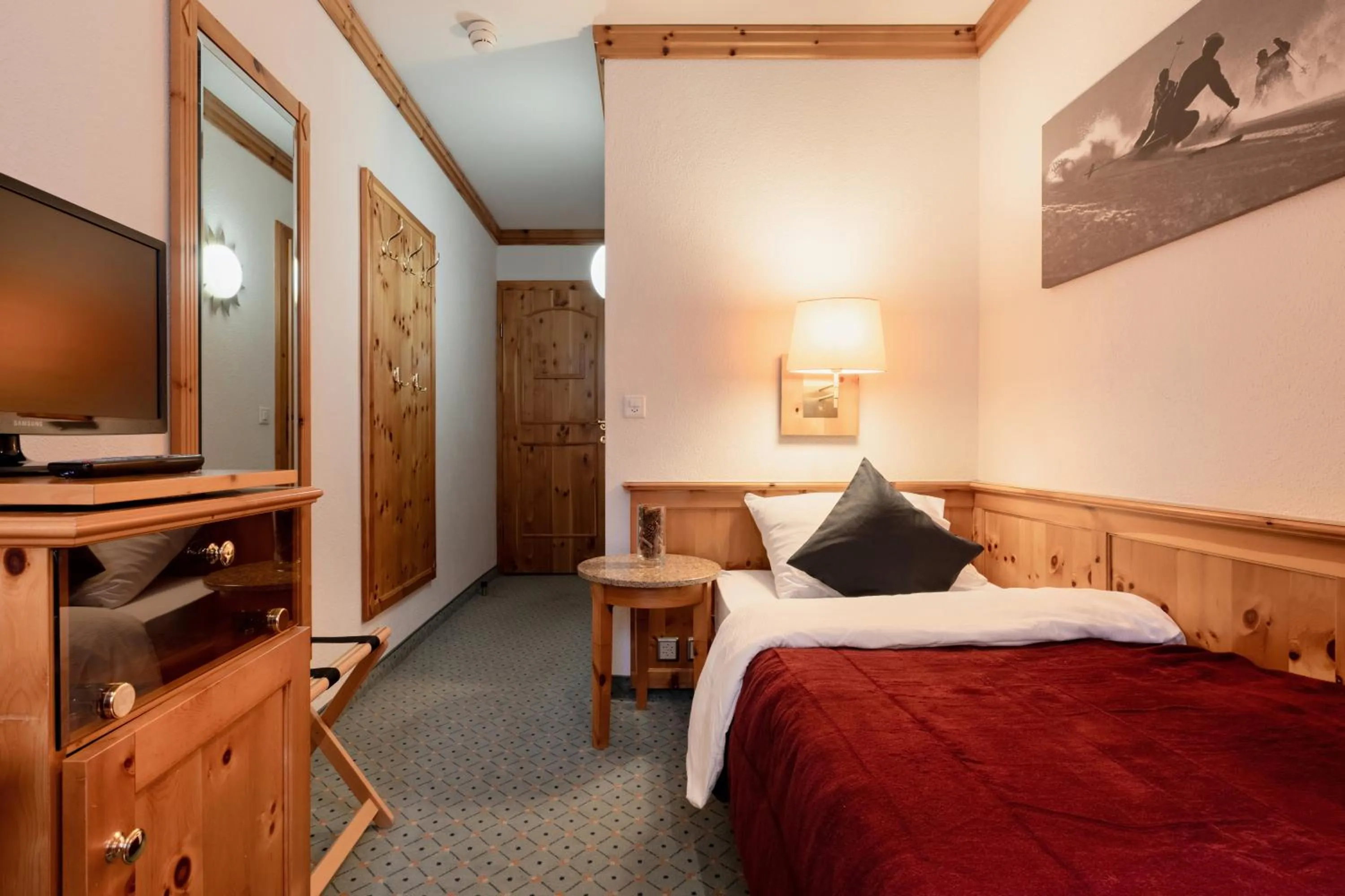 Bedroom, Bed in AROSA ALPINE CLUB - Adults only