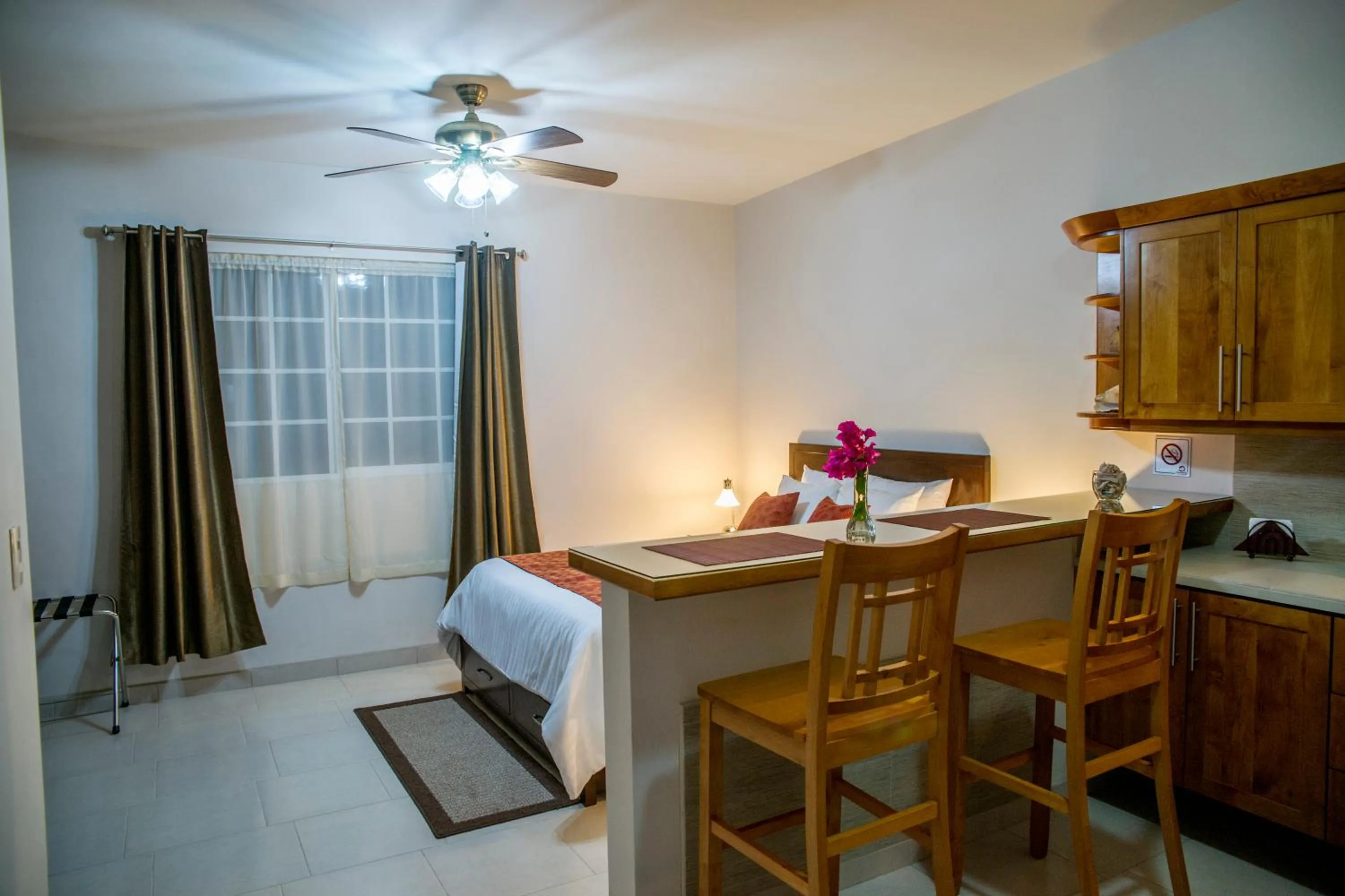 Decorative detail, Bed in Bugambilias Suites