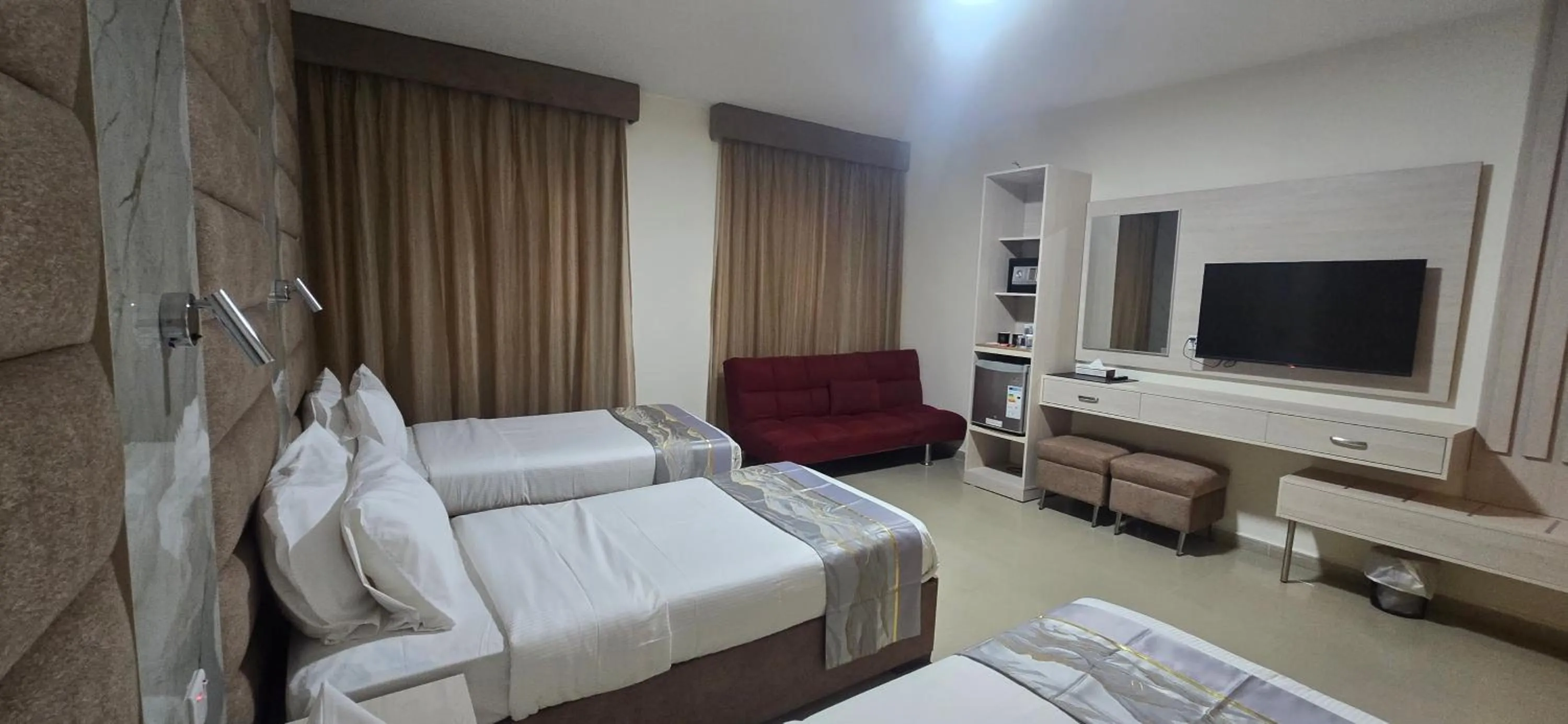 Bed in La Maison Hotel