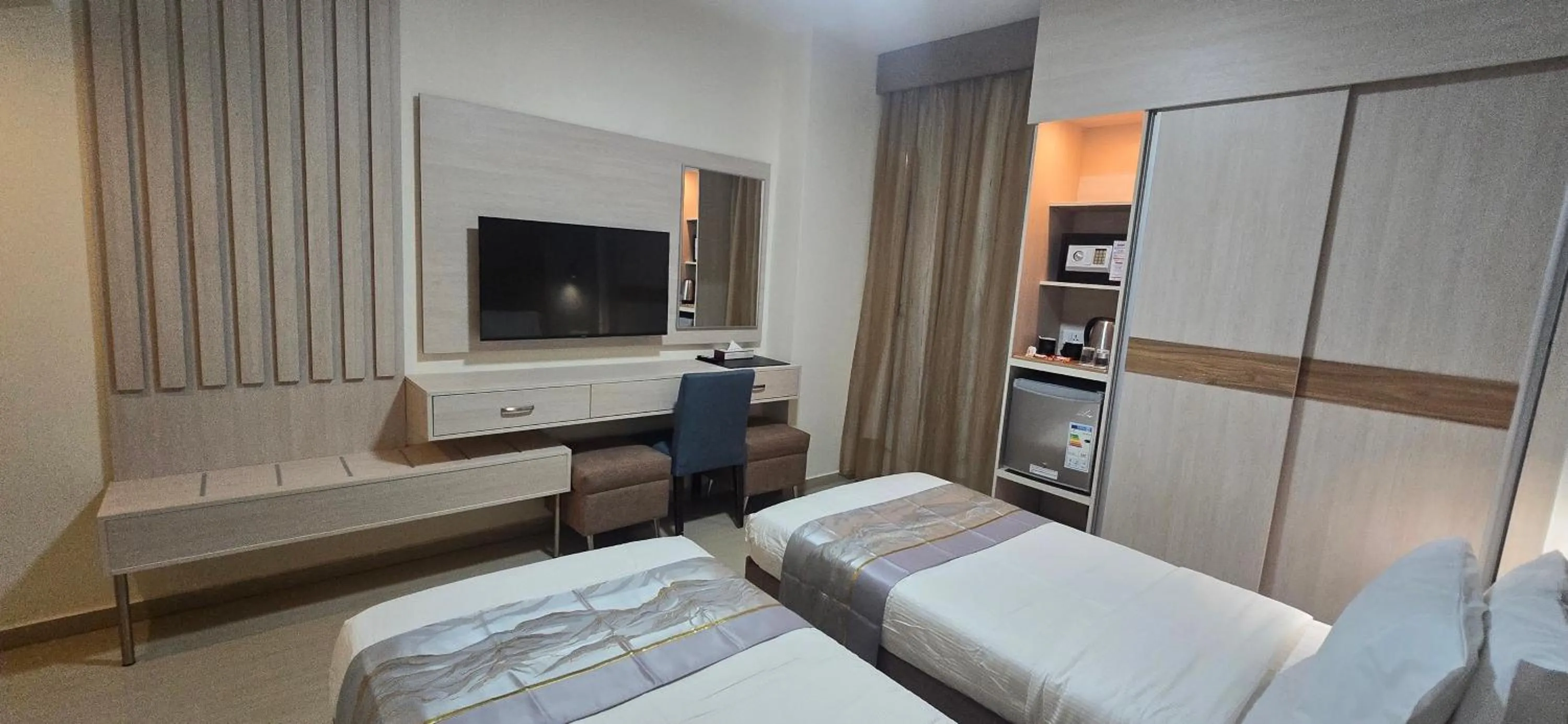 Bed in La Maison Hotel