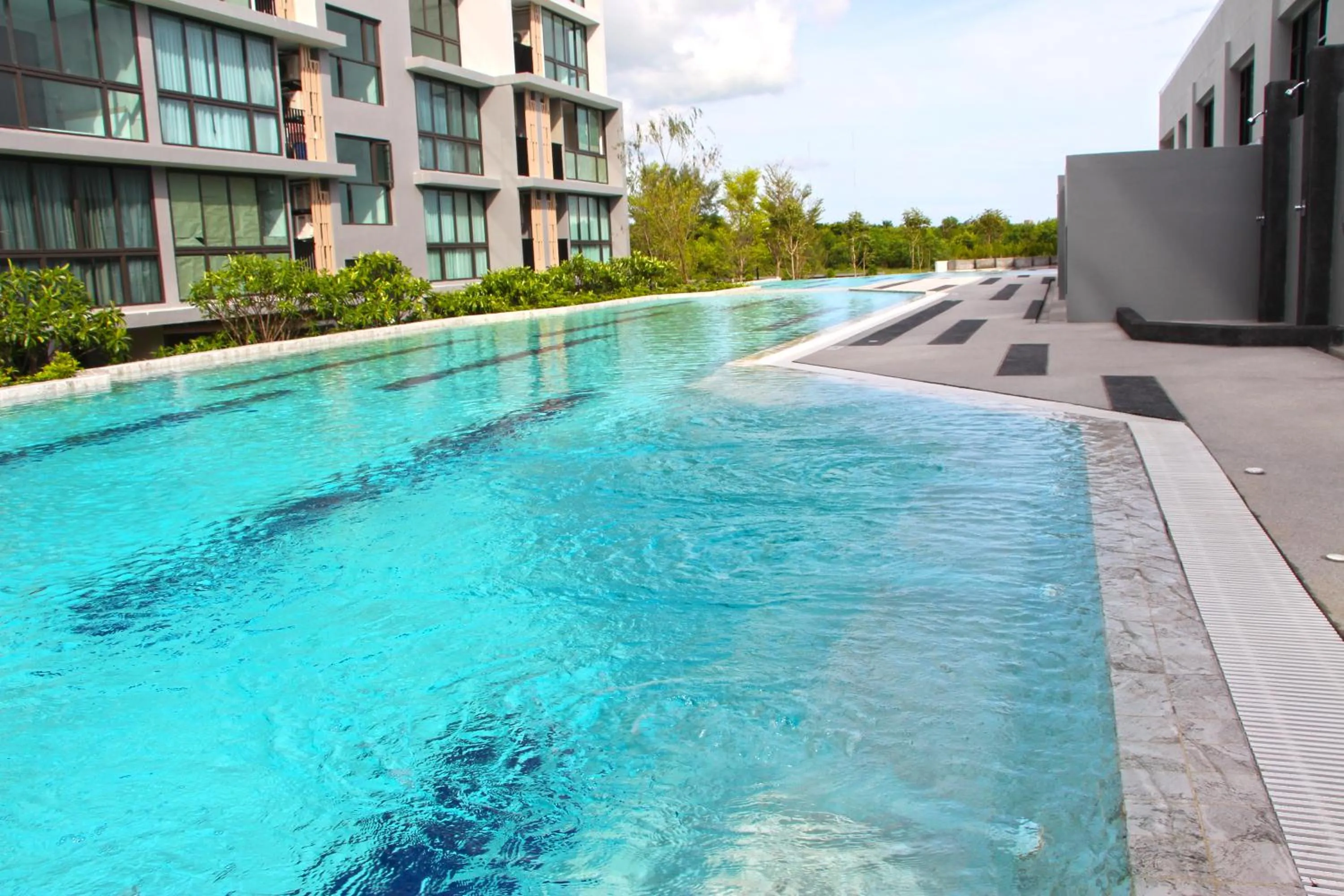 Swimming pool in Connext Residence Phuket