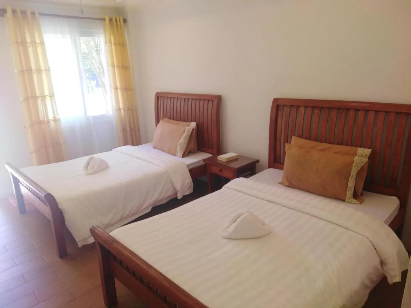 Bed in Happy Ripples Beach Resort