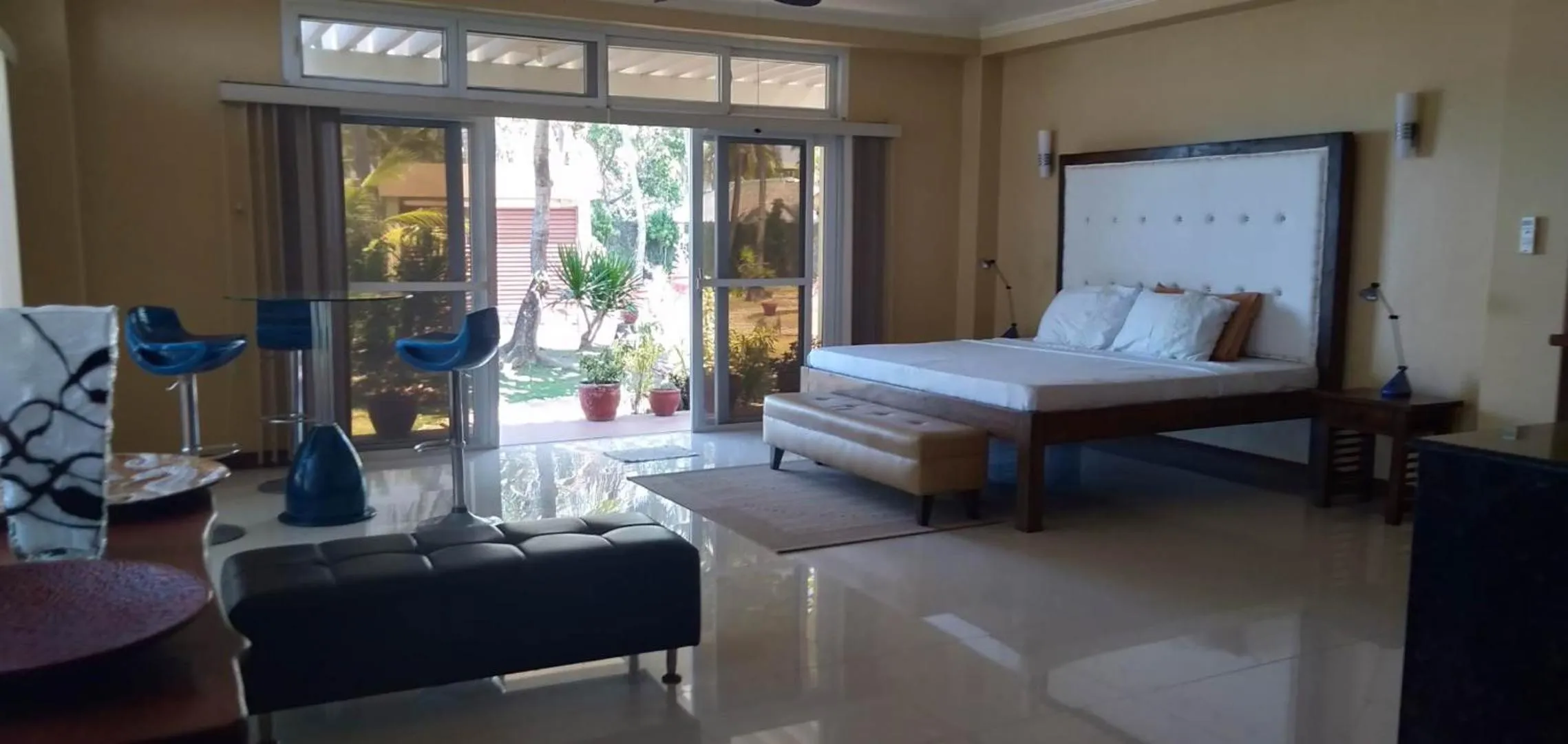 Bed in Happy Ripples Beach Resort