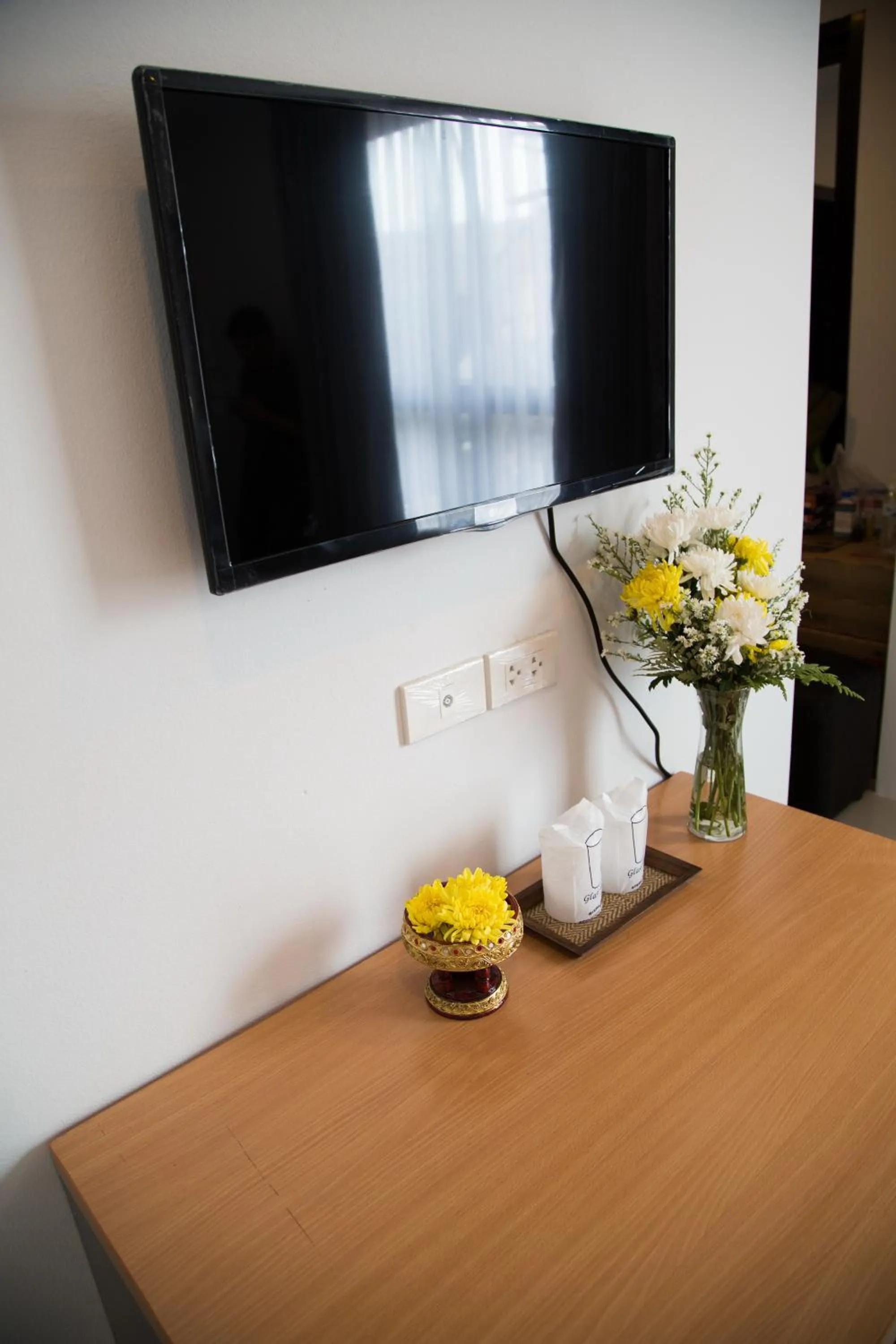 Decorative detail, TV/Entertainment Center in Noble Tarntong Boutique Hotel (SHA Extra Plus)