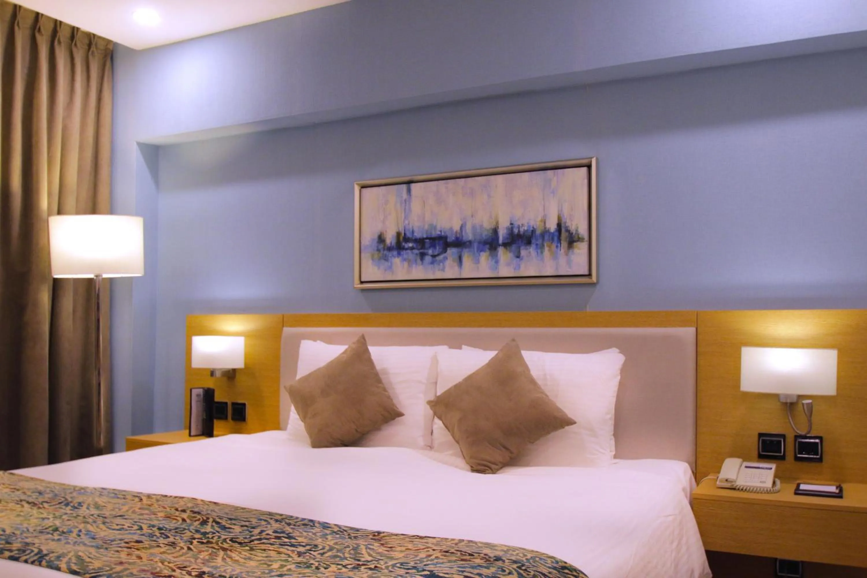 Bed in MENA Tyche Hotel Amman