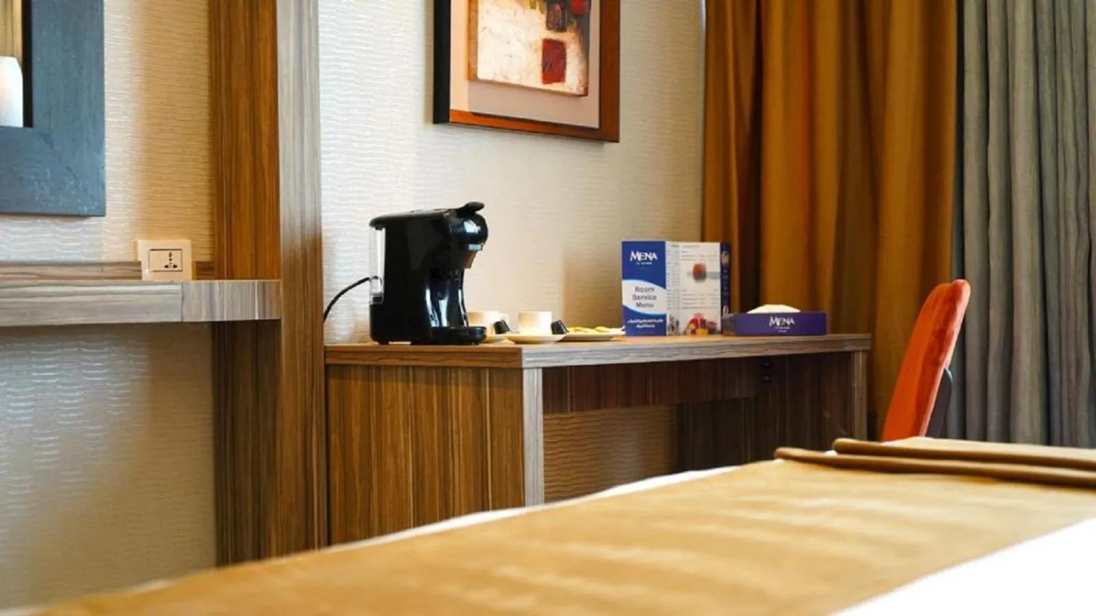 Communal lounge/ TV room, Bed in MENA Tyche Hotel Amman