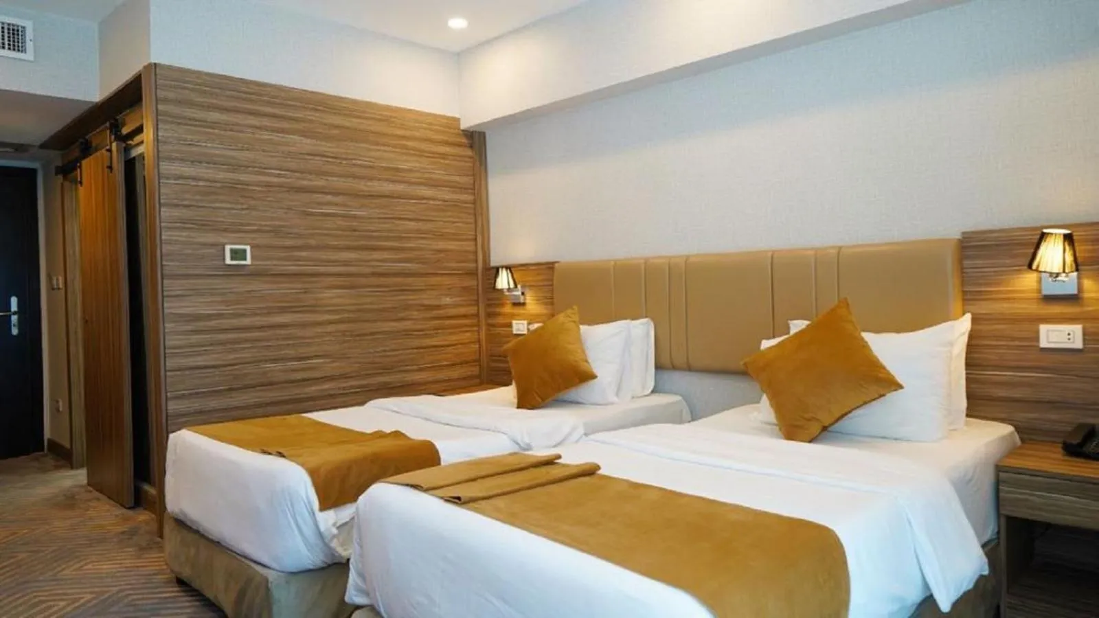 Bed in MENA Tyche Hotel Amman