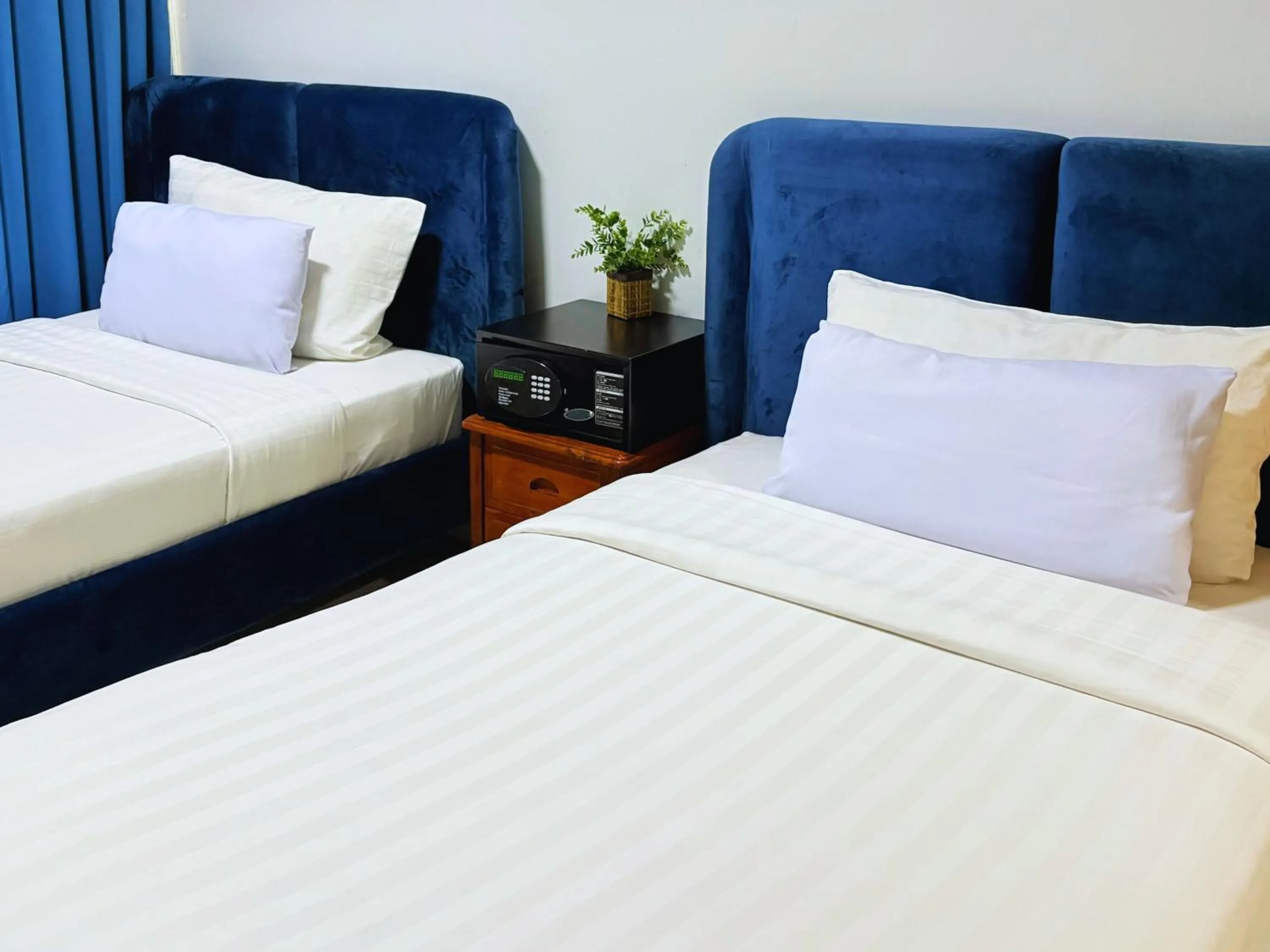 Bed in Pacific Park Hotel