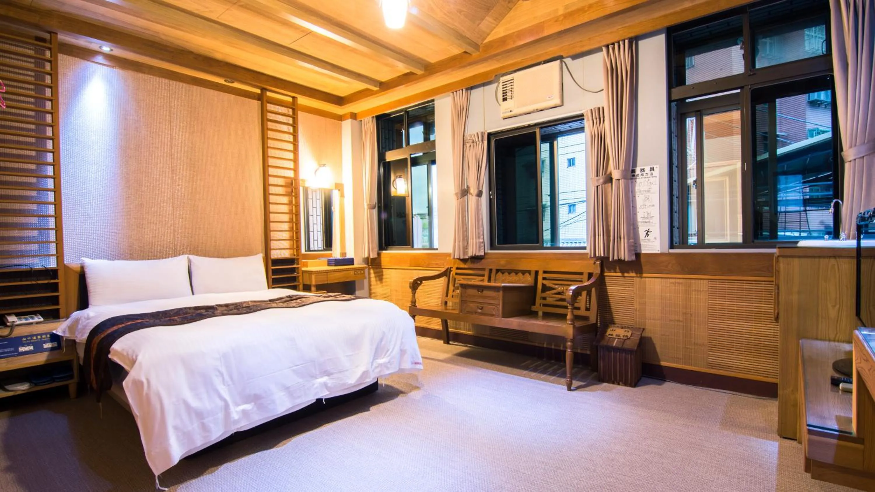 Photo of the whole room, Bed in Shankou Hotspring Hotel