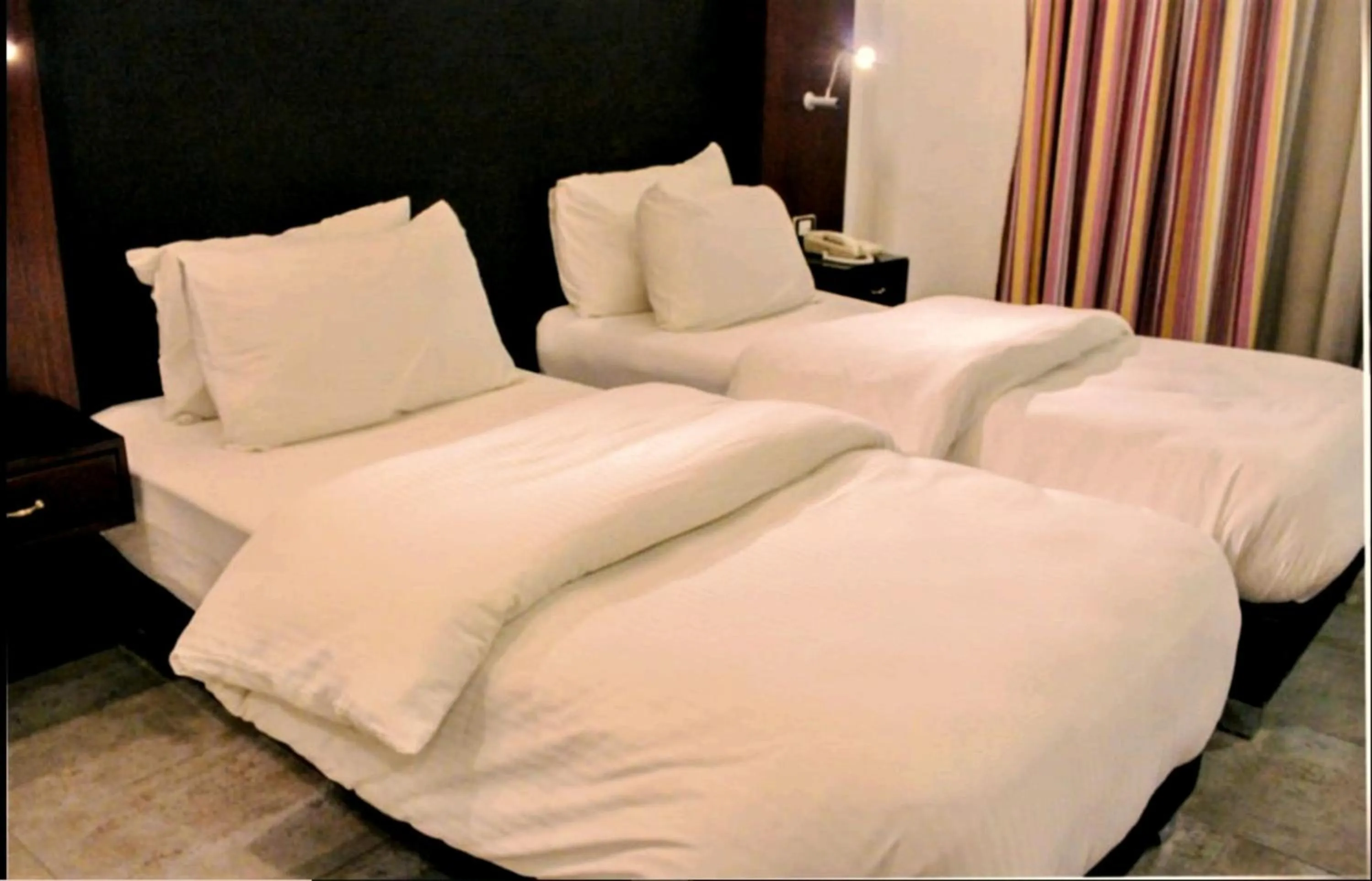Bed in Torino Hotel Amman