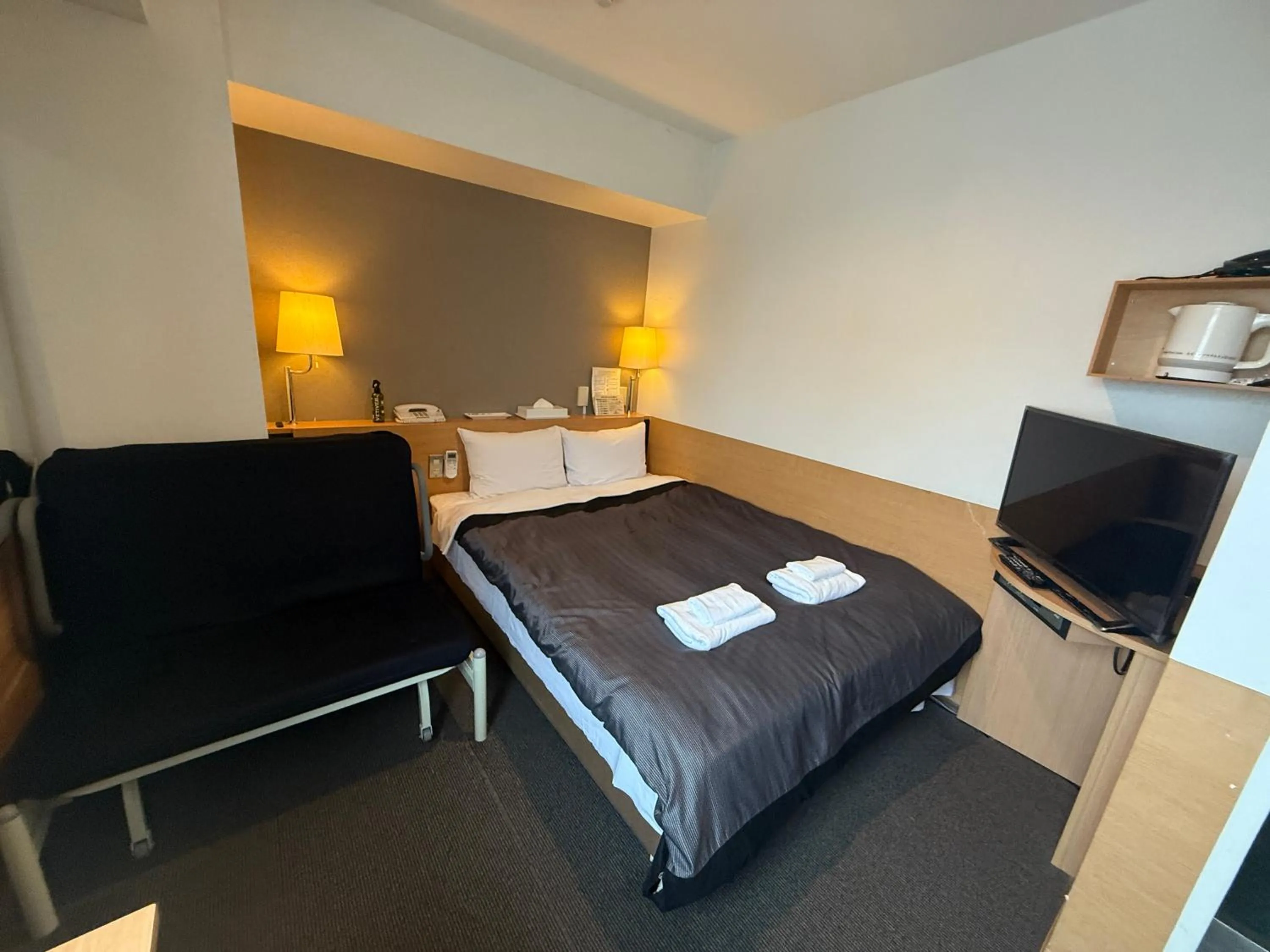 Bedroom in Hotel Kamoike Plaza