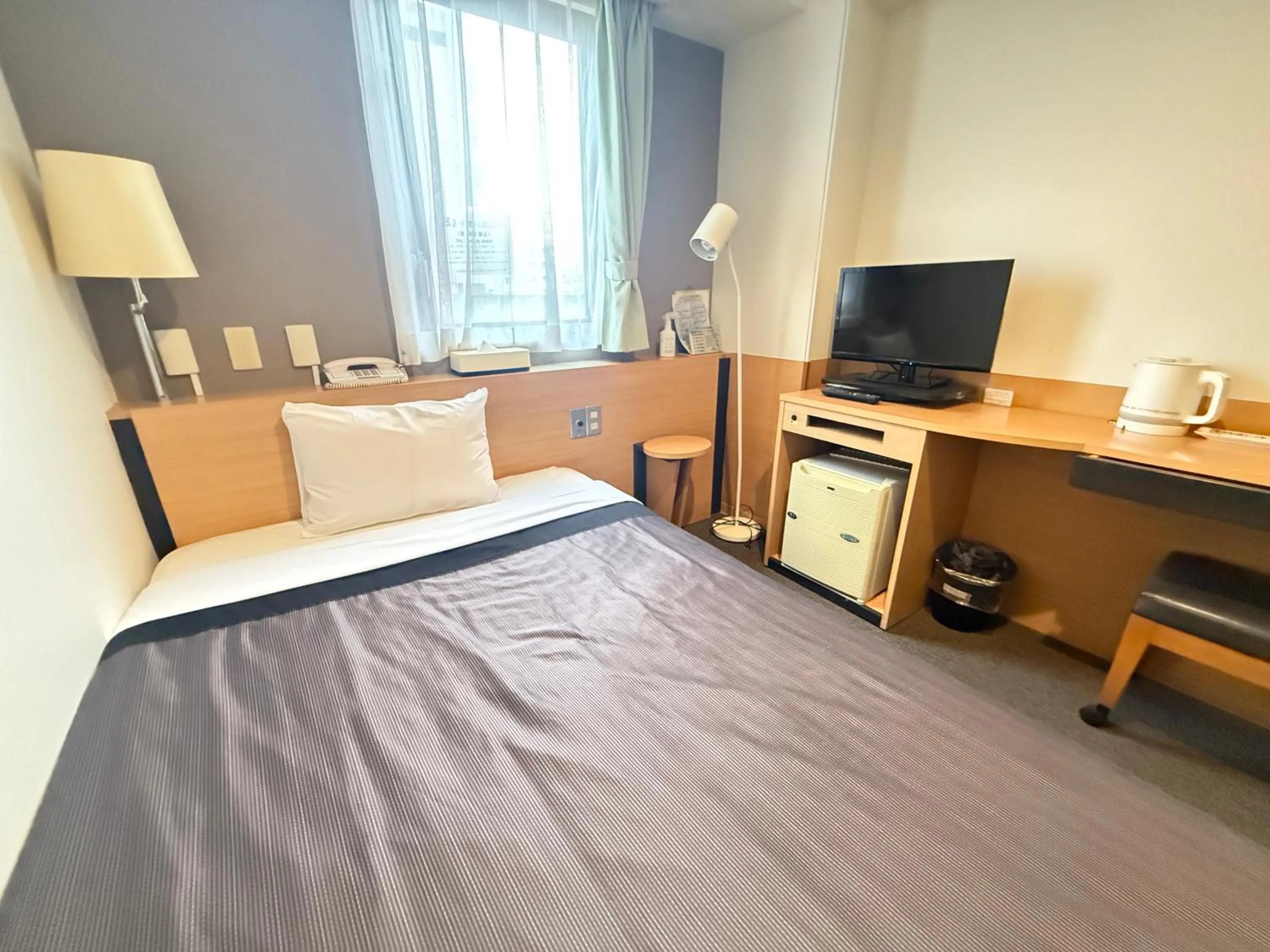 Bedroom in Hotel Kamoike Plaza