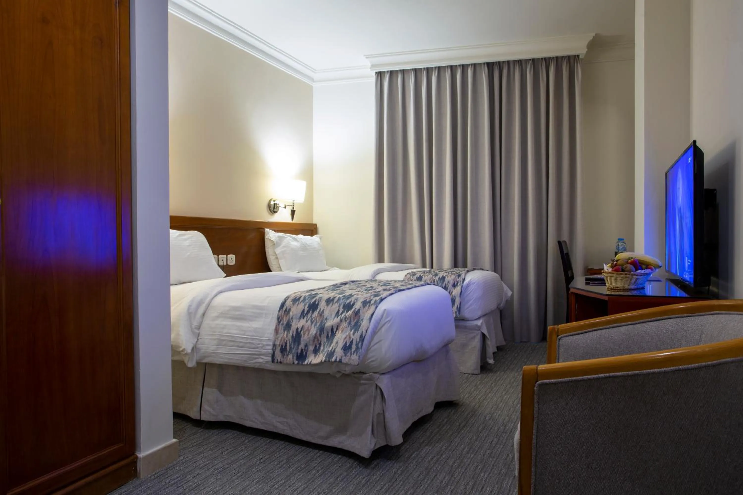 Communal lounge/ TV room, Bed in Sadeen Amman Hotel