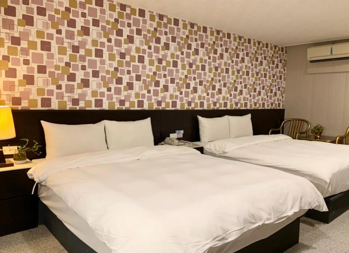 Bed in Jing Dian Business Hotel