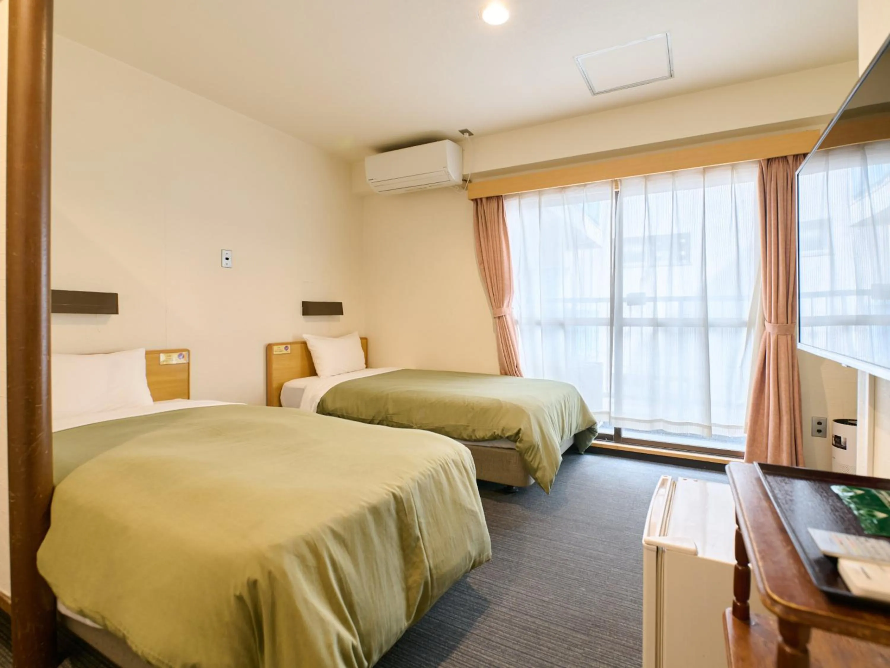 Bed in Tabist Hotel Tetora Ikebukuro