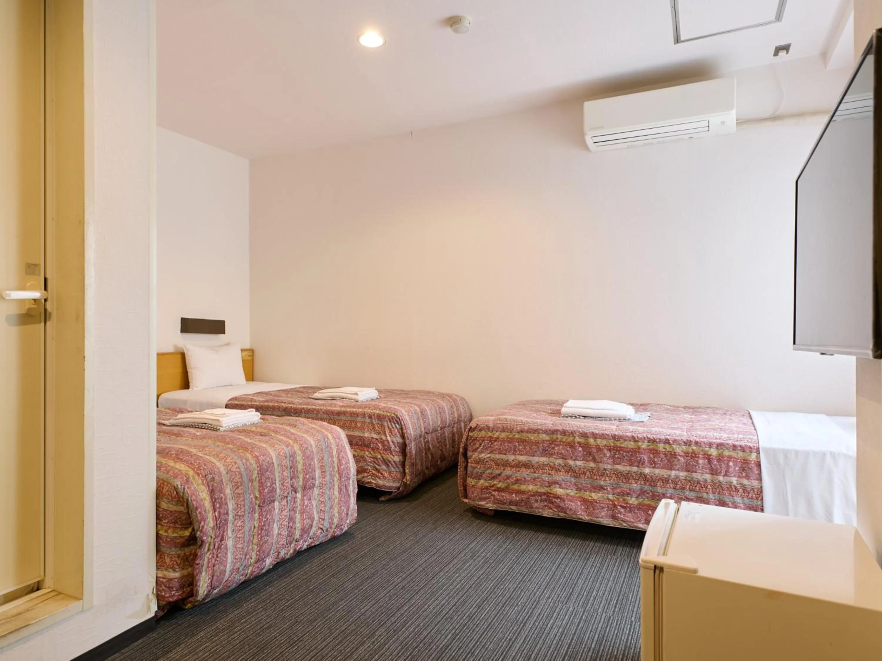 Bed in Tabist Hotel Tetora Ikebukuro