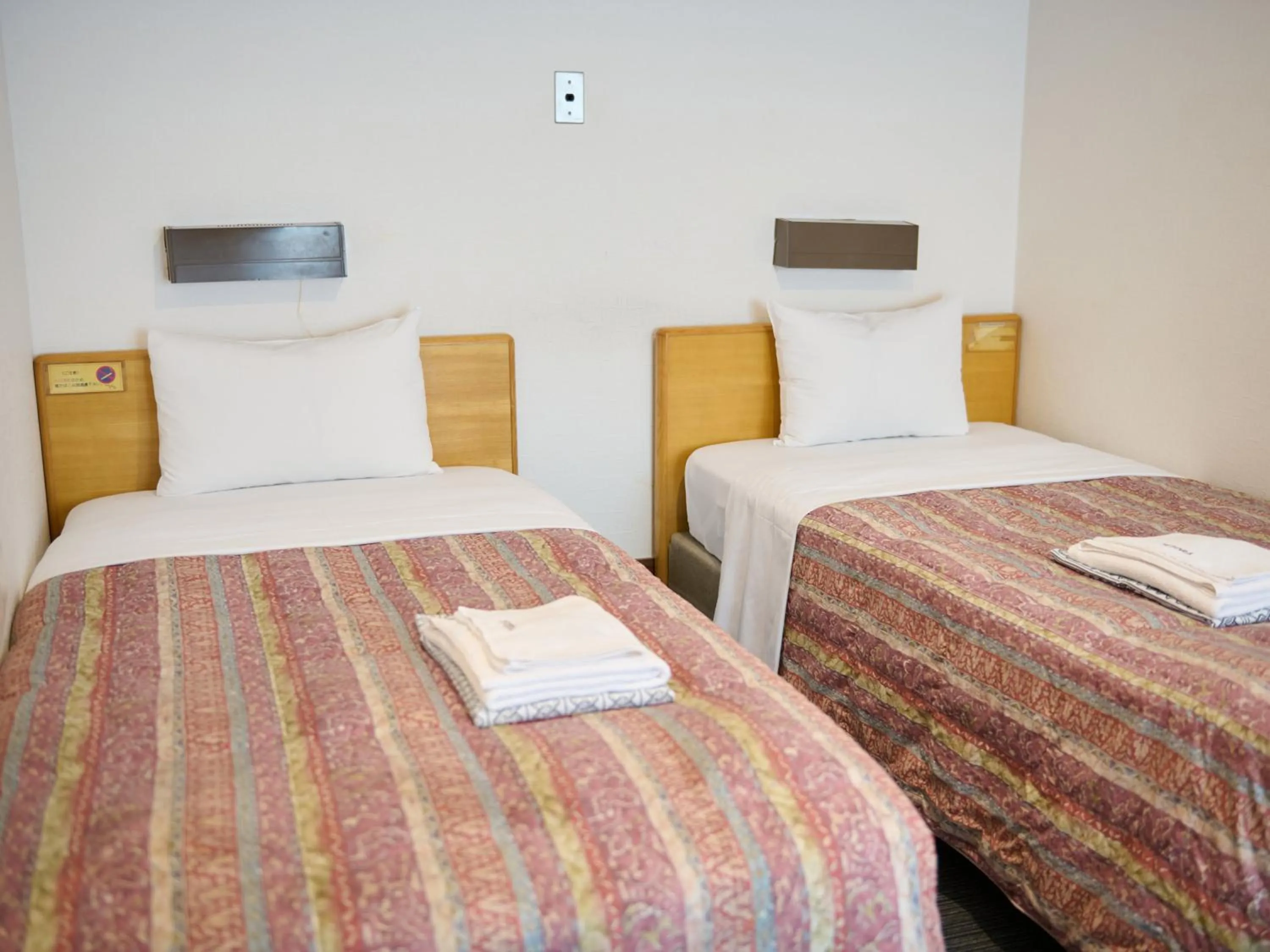 Bed in Tabist Hotel Tetora Ikebukuro