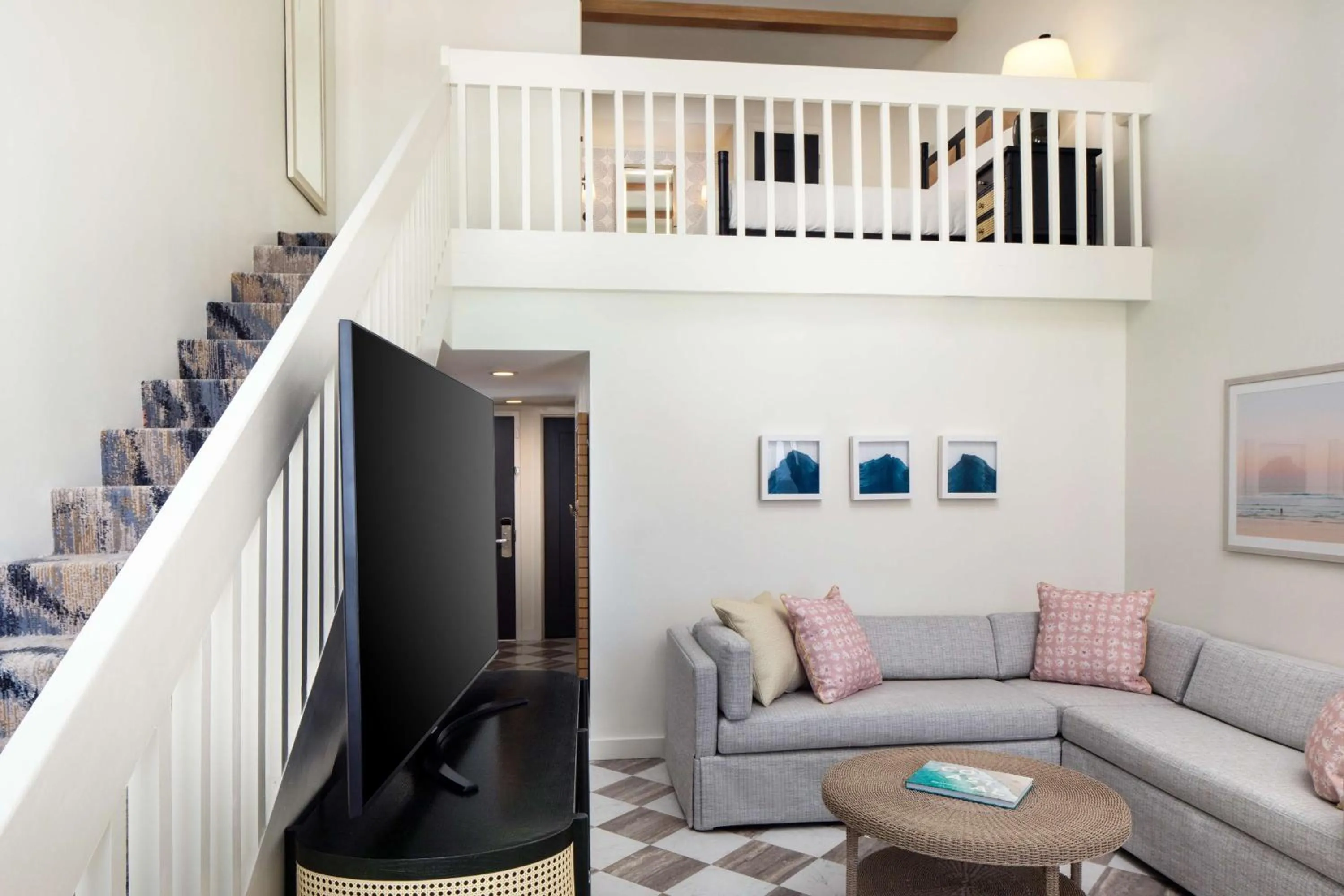 Living room in Casa Marina Key West, Curio Collection by Hilton