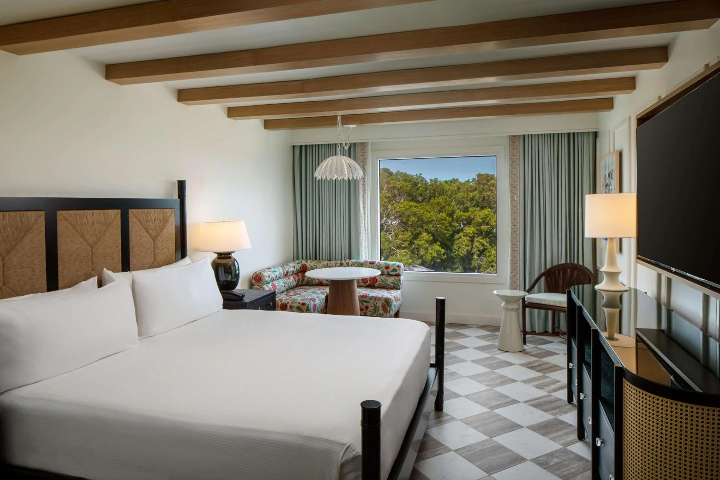 Living room, Bed in Casa Marina Key West, Curio Collection by Hilton