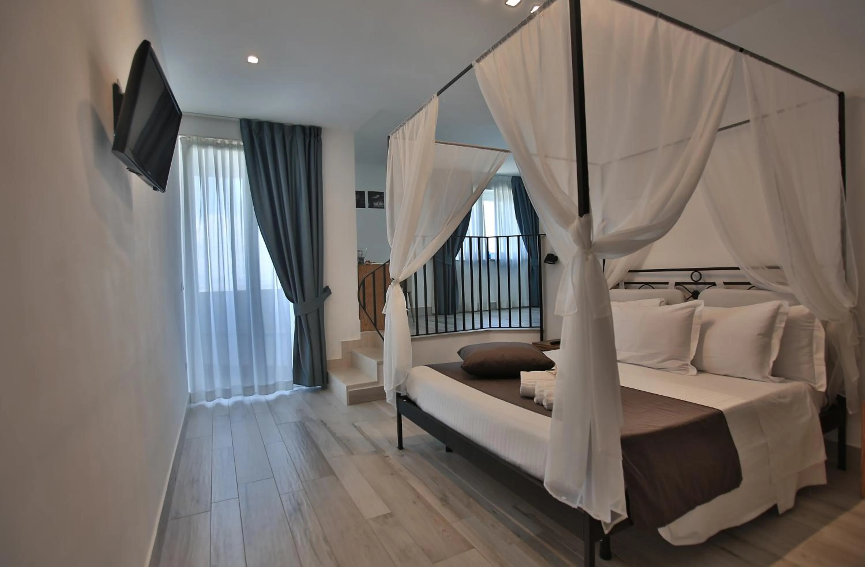 Photo of the whole room, Bed in Relais Manfredi