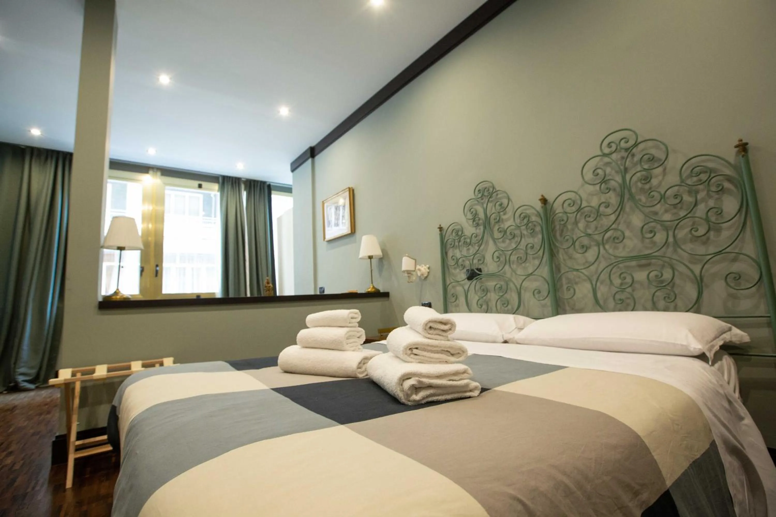 Bed in Two Sisters Suites