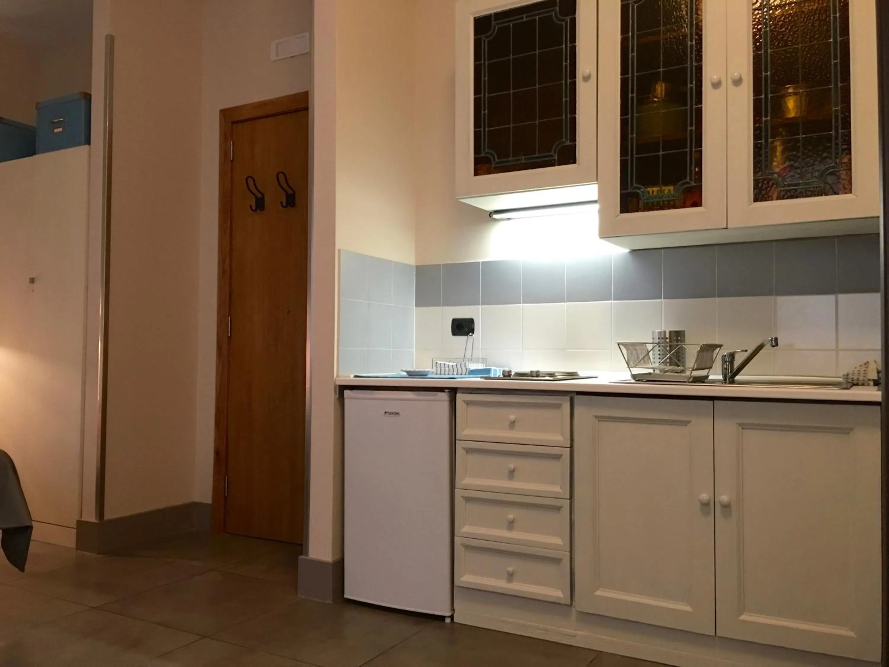 Kitchen or kitchenette in Two Sisters Suites