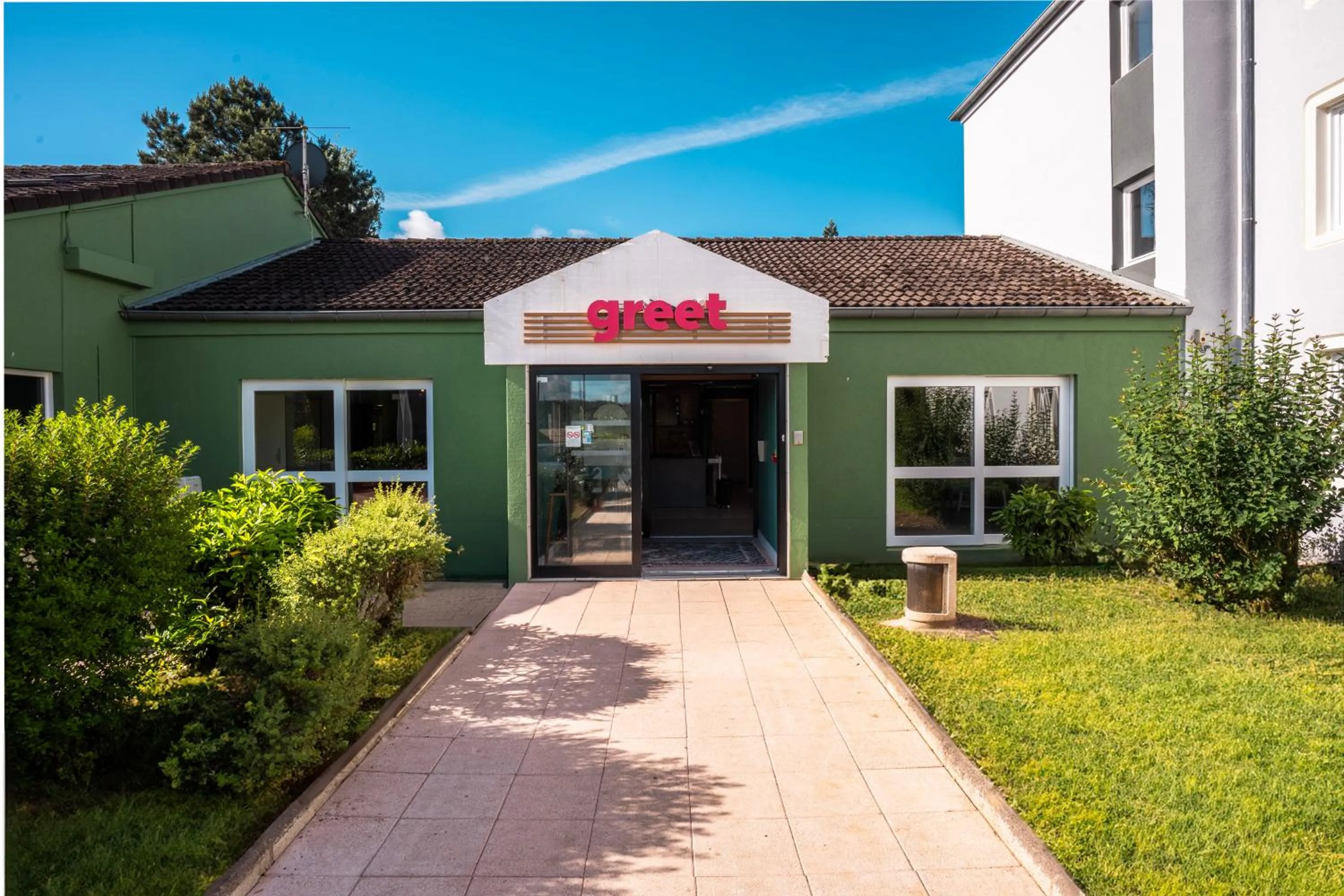 Property building in Hôtel Restaurant Relais Vert - Montbeliard