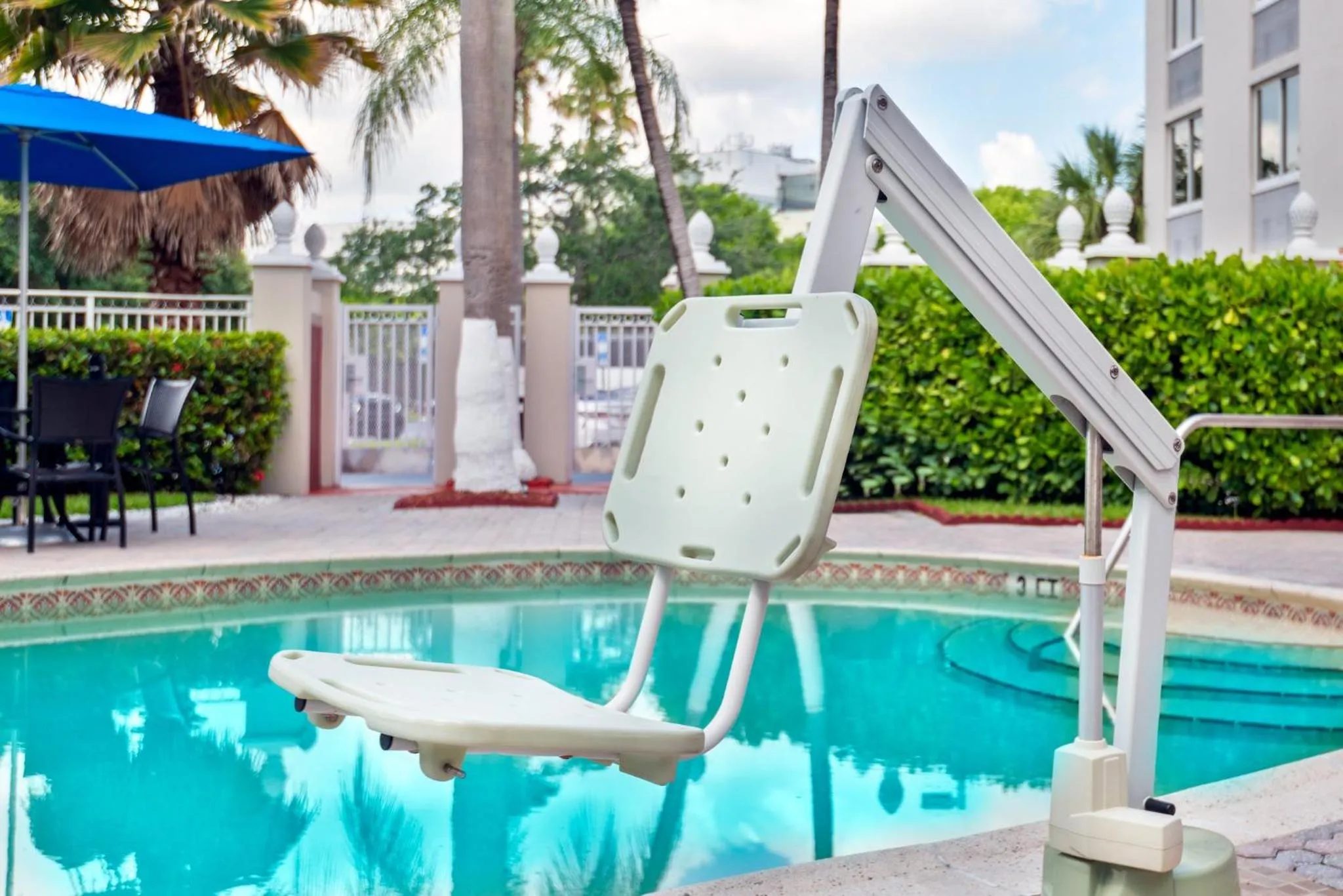 Swimming pool in Holiday Inn Express Miami Airport Doral Area by IHG