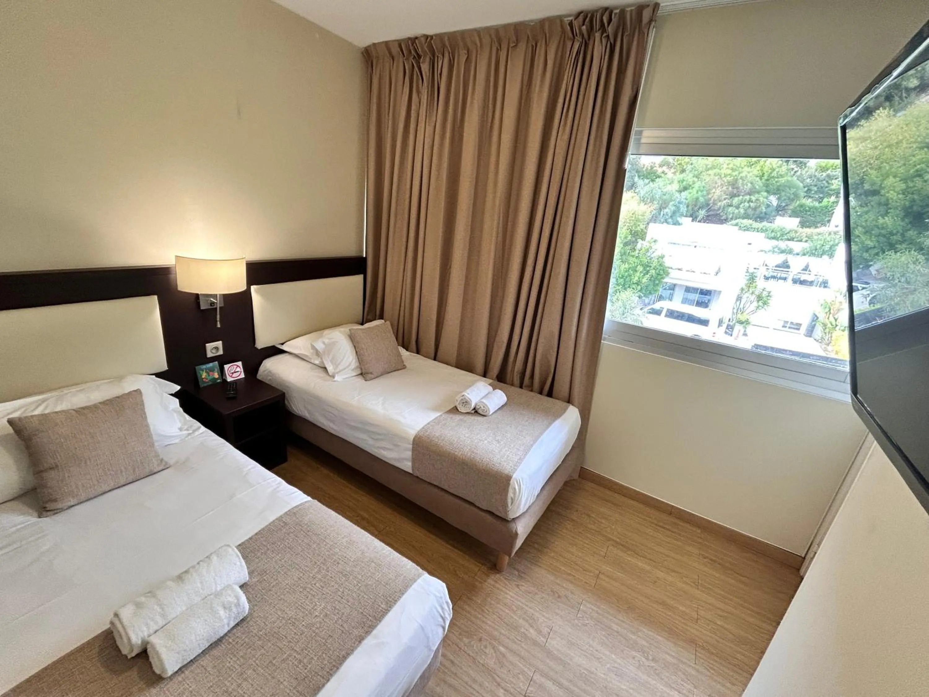 Bed in Hôtel La Pinède