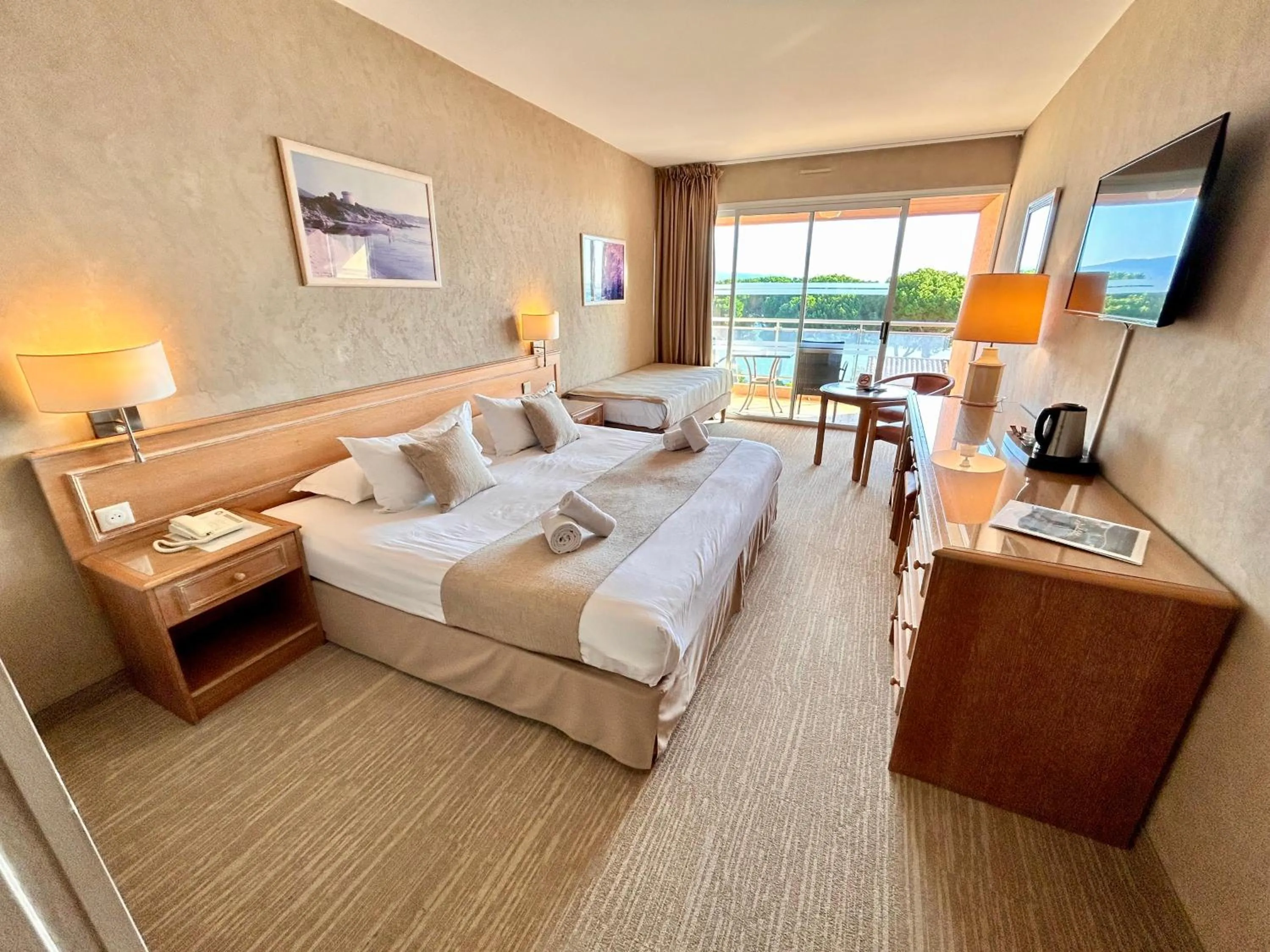 Photo of the whole room, Bed in Hôtel La Pinède