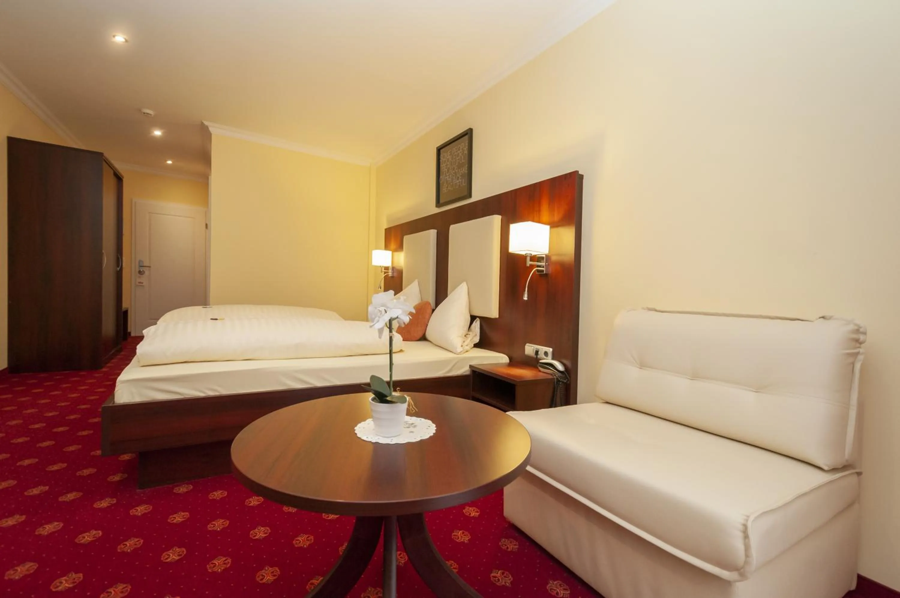 Photo of the whole room, Bed in Hotel Grüne Tanne