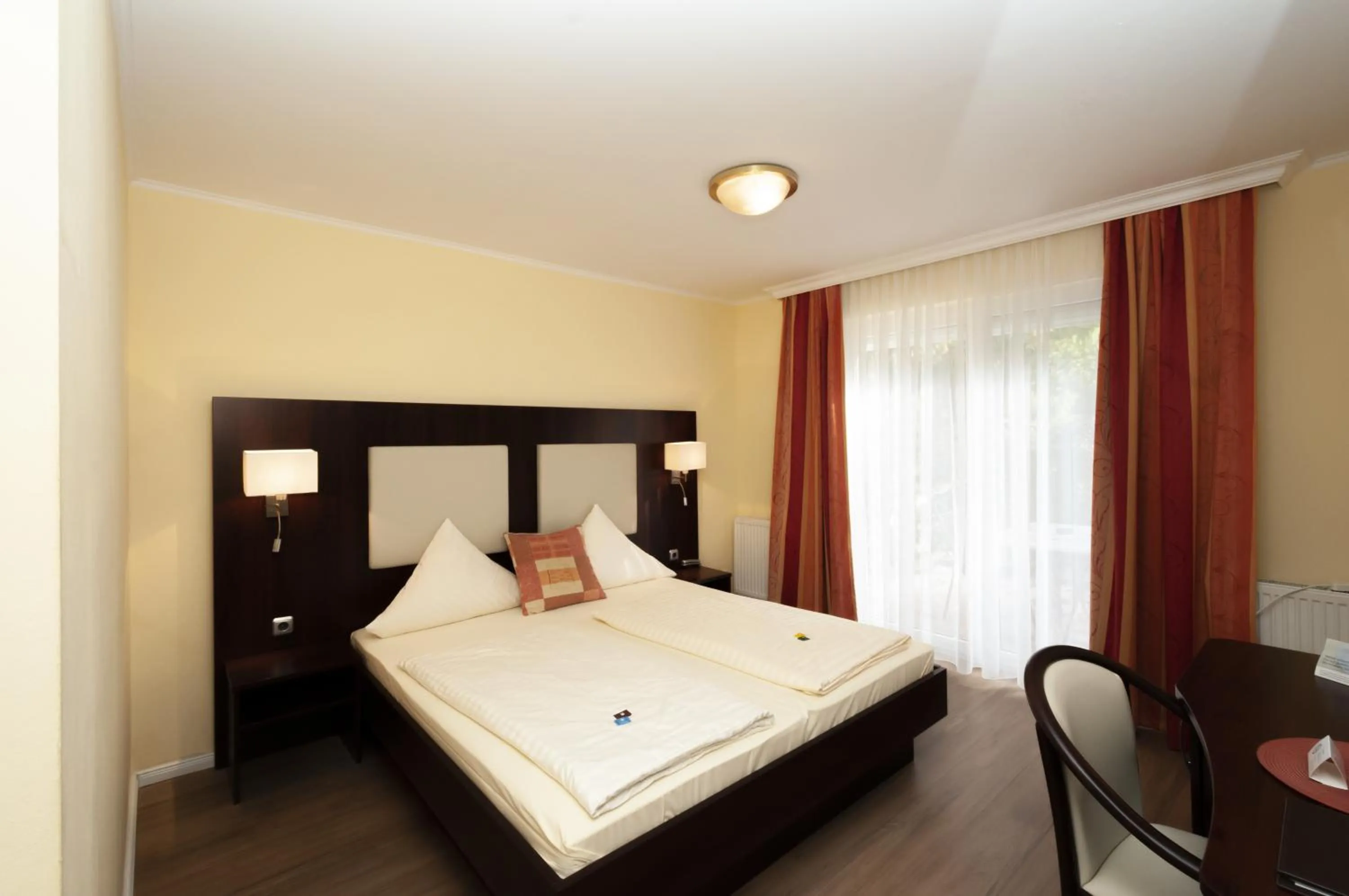 Photo of the whole room, Bed in Hotel Grüne Tanne