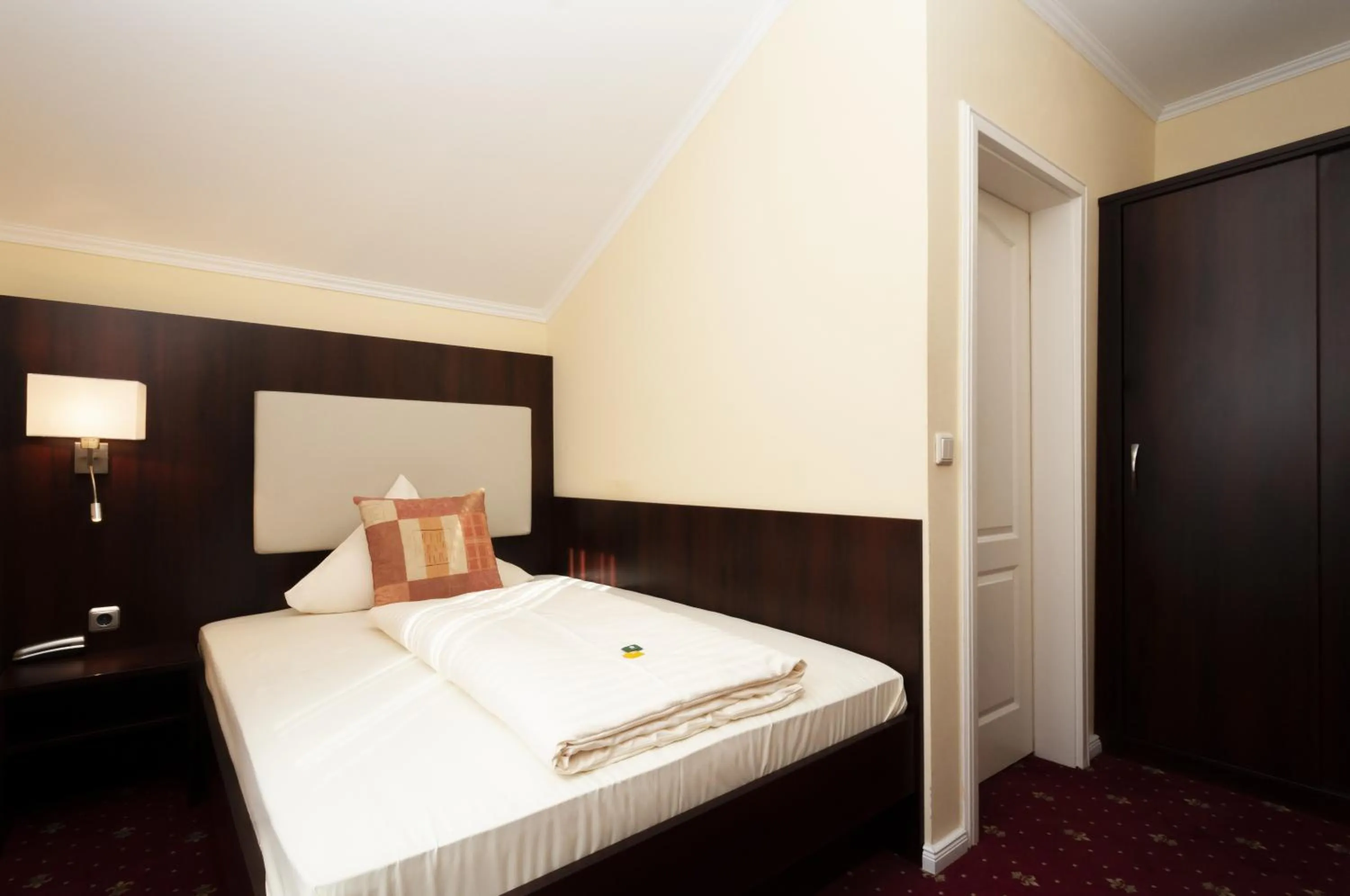 Photo of the whole room, Bed in Hotel Grüne Tanne