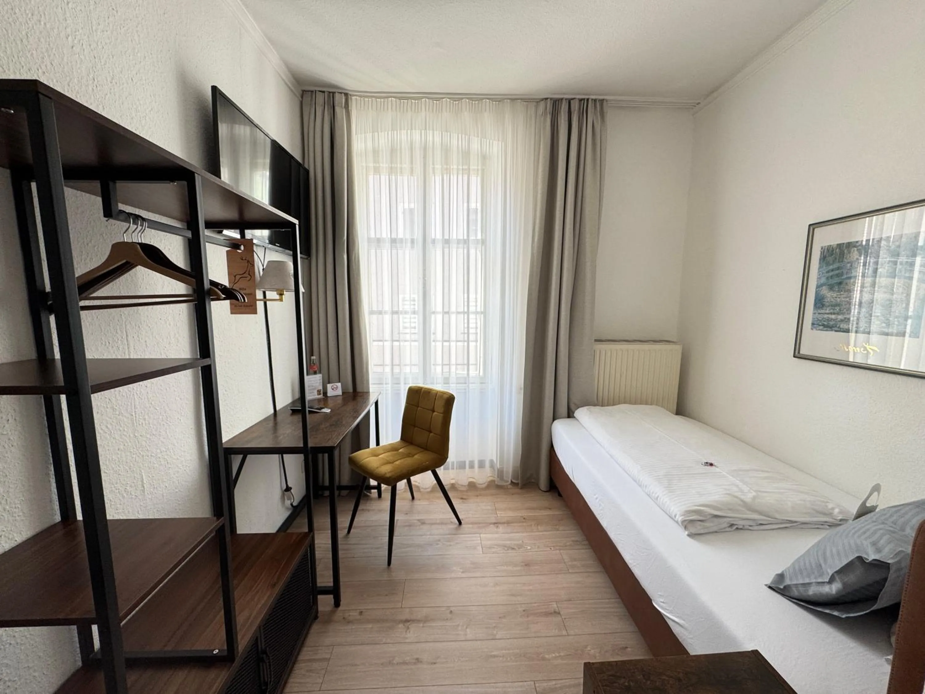 Photo of the whole room, Bed in Hotel Goldener Hirsch