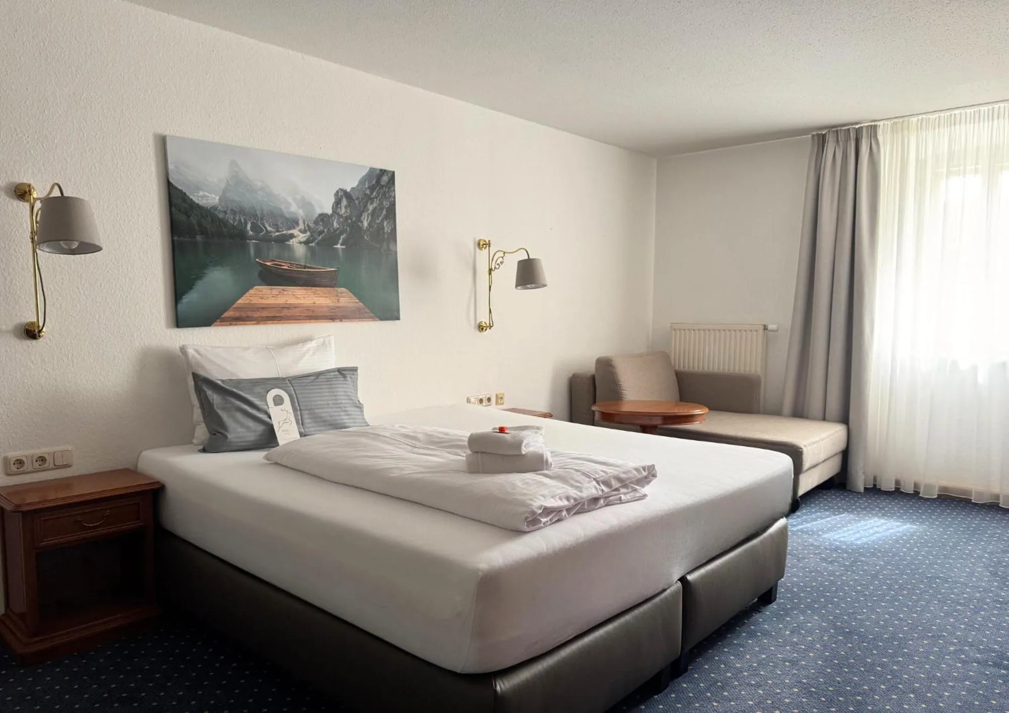 Photo of the whole room, Bed in Hotel Goldener Hirsch