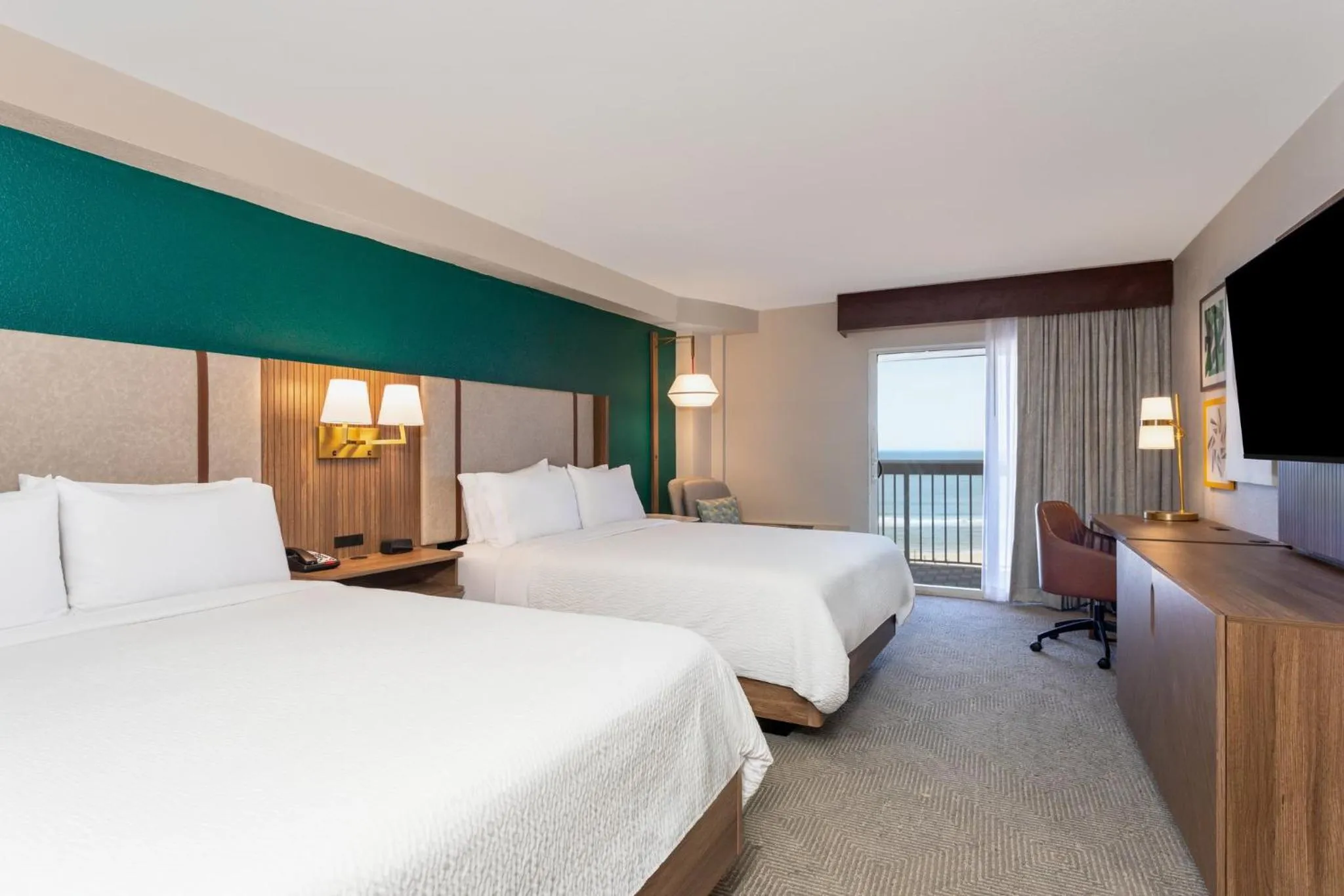 Photo of the whole room, Bed in Holiday Inn Hotel & Suites Daytona Beach On The Ocean by IHG