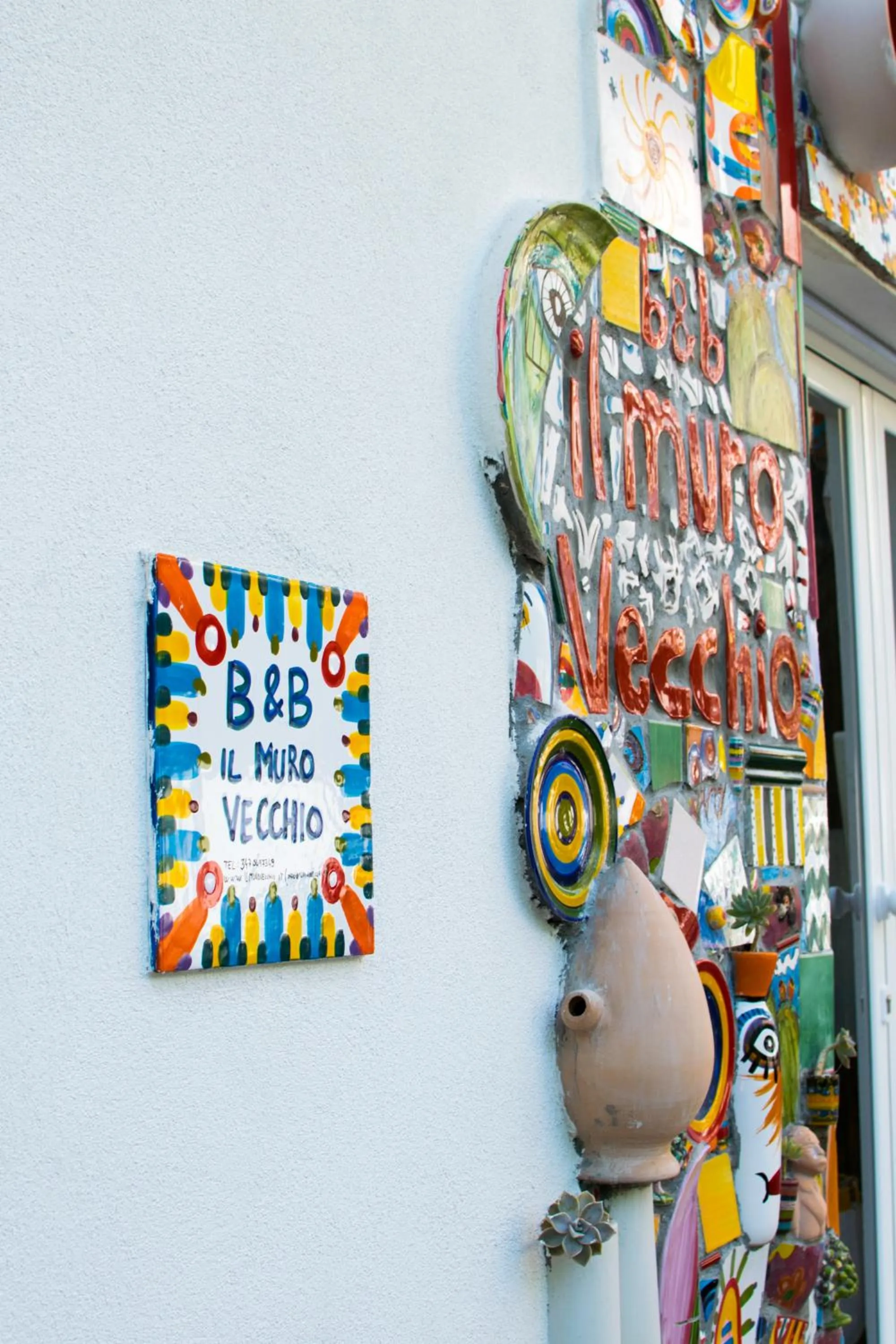 Property logo or sign in Il Muro Vecchio Design