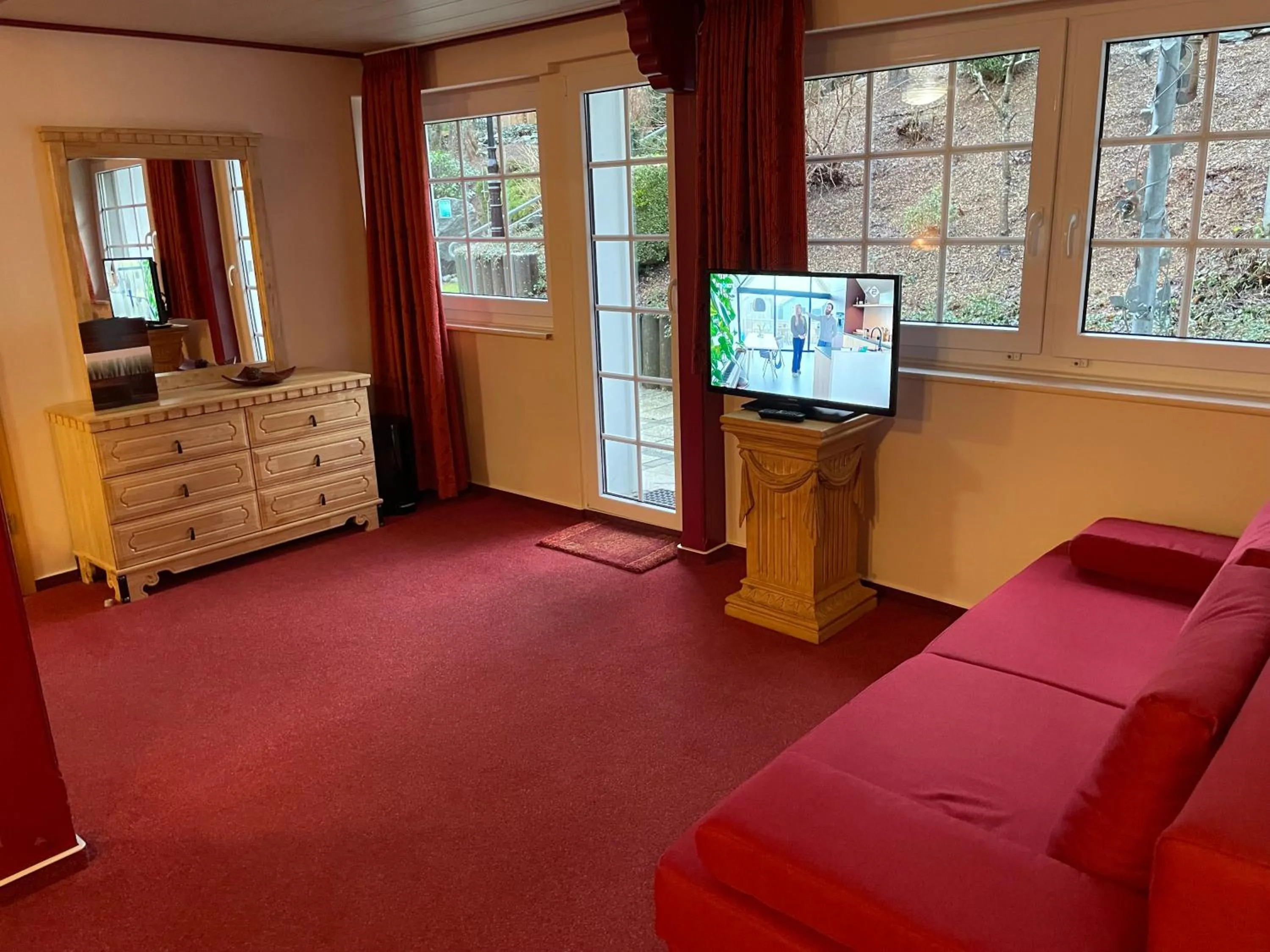 Communal lounge/ TV room in Land-Hotel Mühlengrund