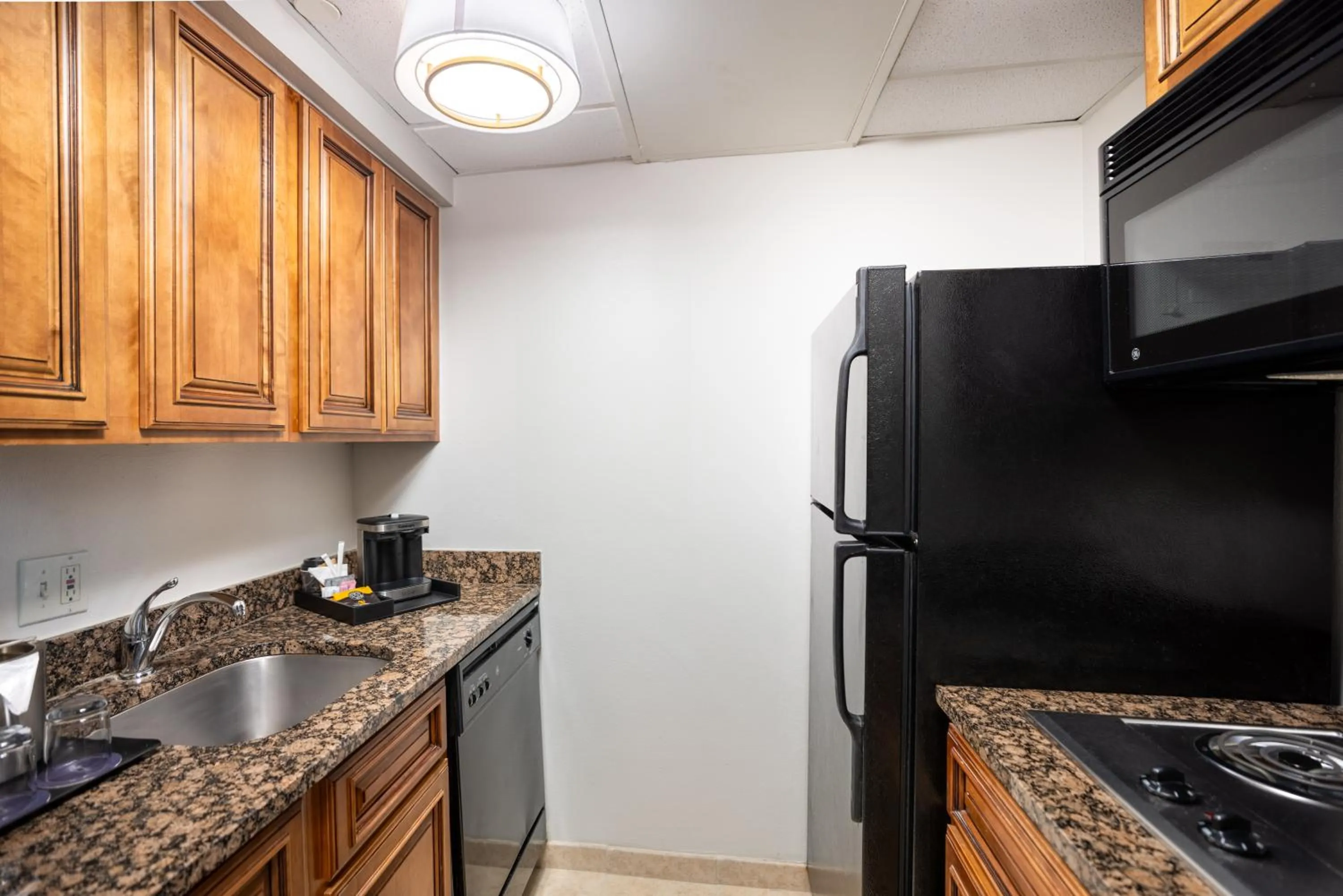 Kitchen or kitchenette in DoubleTree by Hilton Houston Medical Center Hotel & Suites