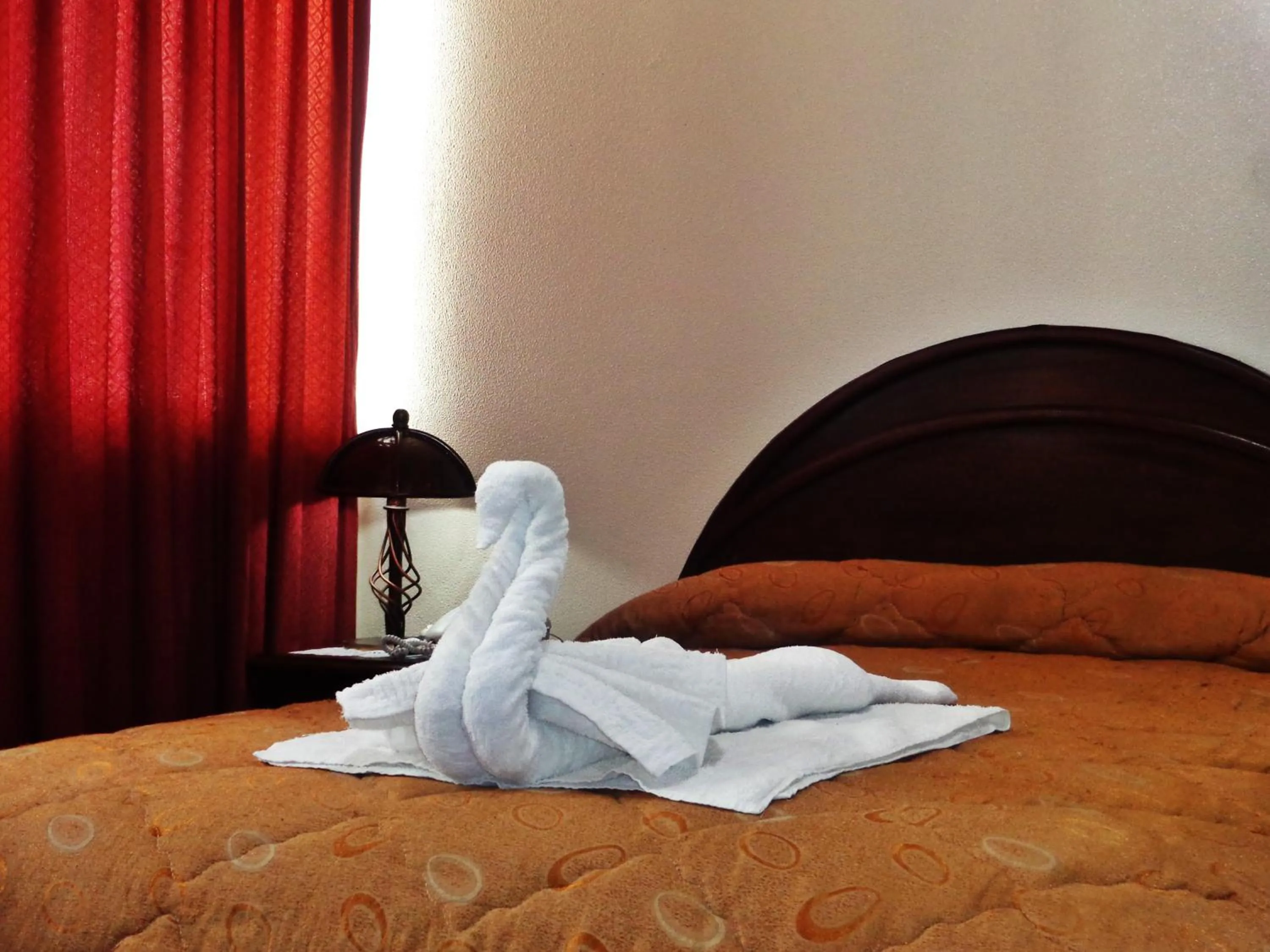 Bed in Hotel Alexander