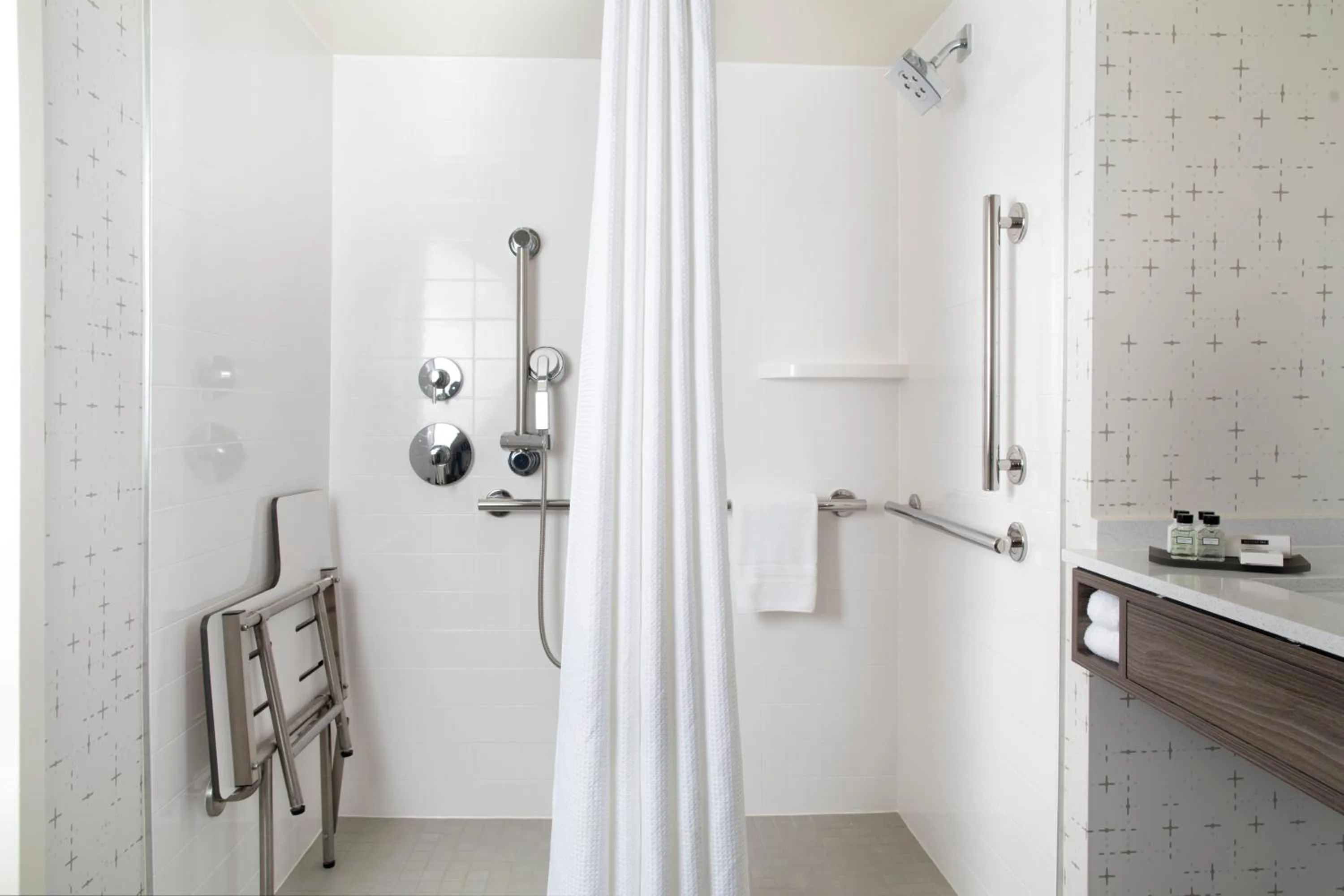 Bathroom in Crowne Plaza Atlanta Perimeter at Ravinia by IHG