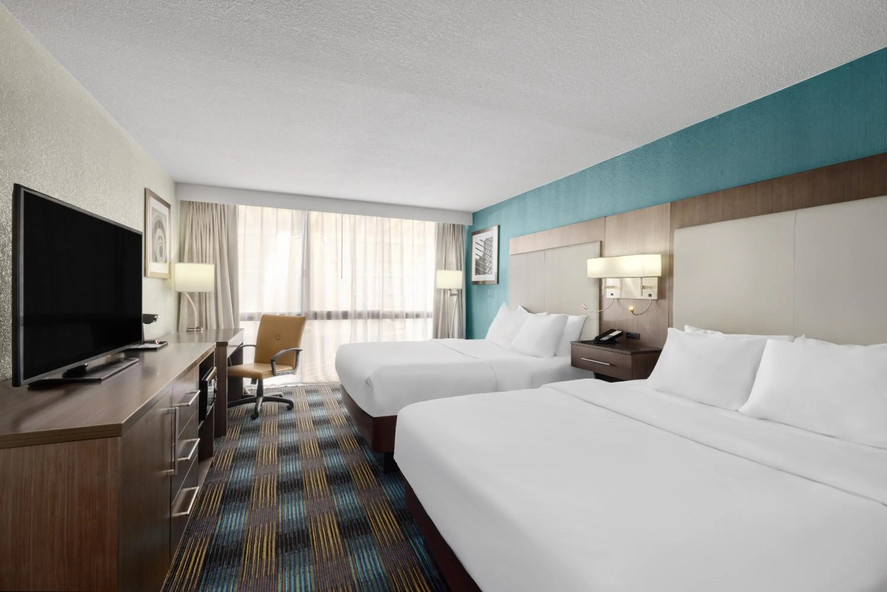 Bedroom, Bed in Wingate by Wyndham Kansas City