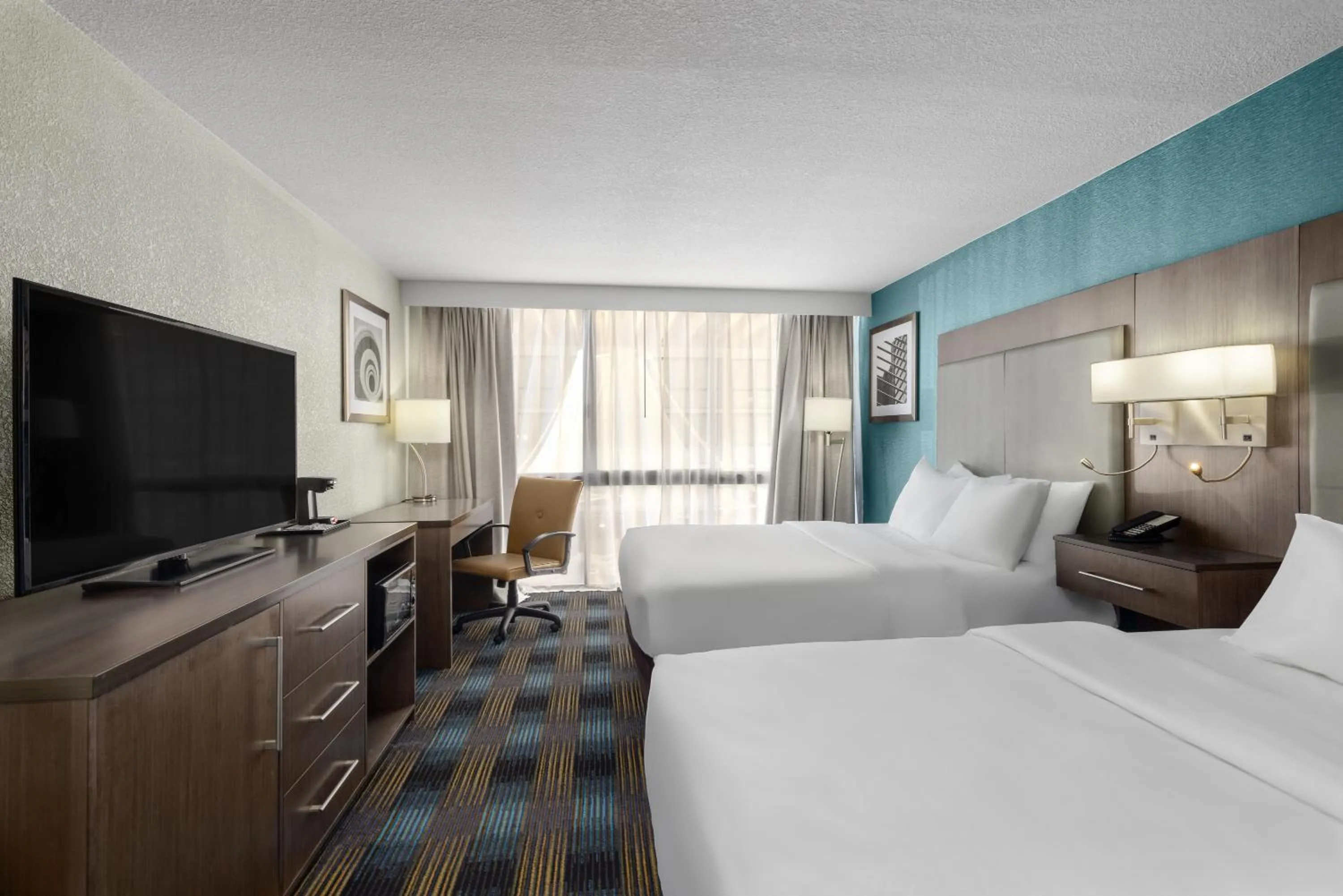 Bed in Wingate by Wyndham Kansas City