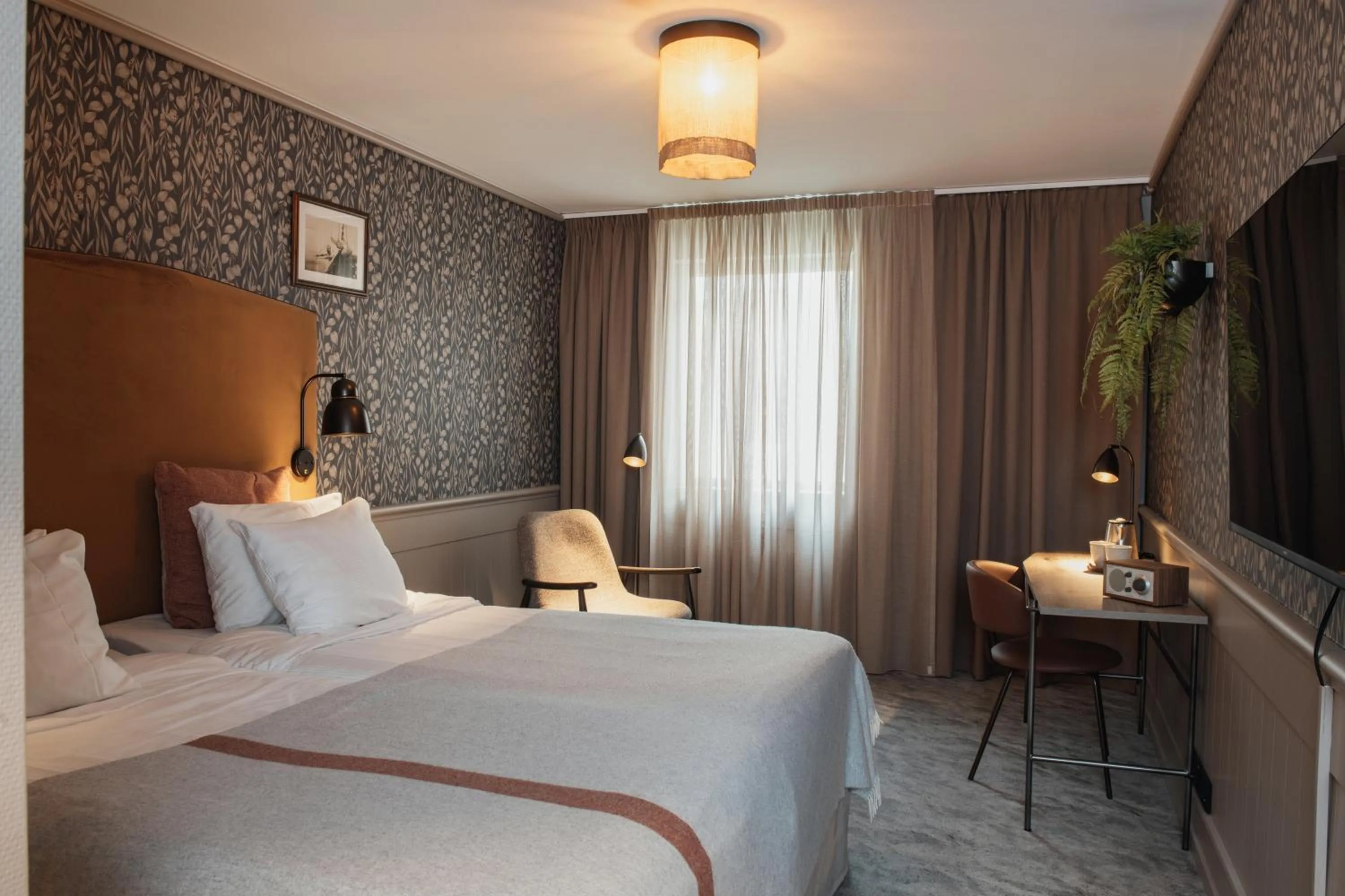 Photo of the whole room, Bed in Home Hotel Fregatten