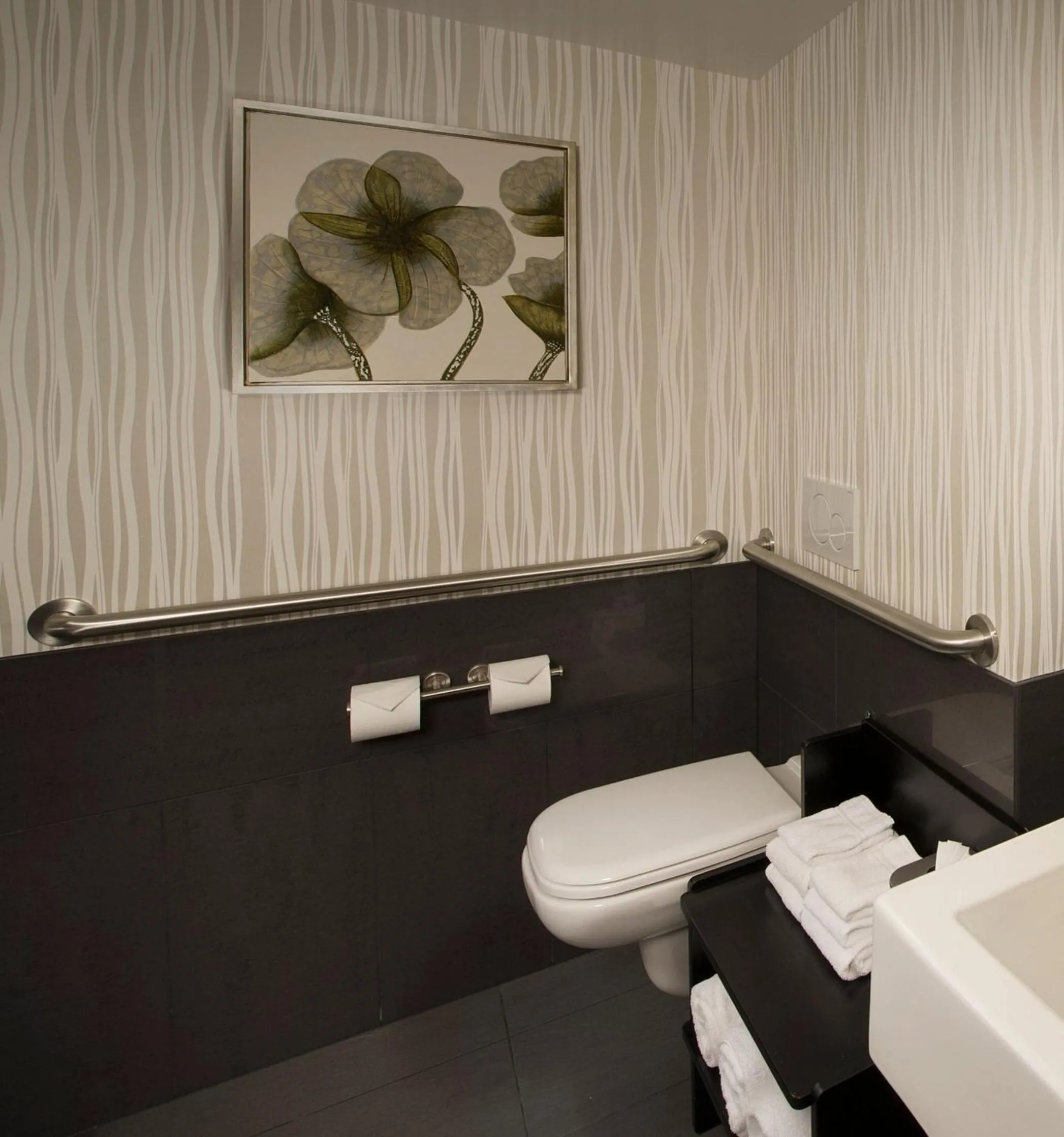 Toilet in Skybridge Seattle Airport Hotel