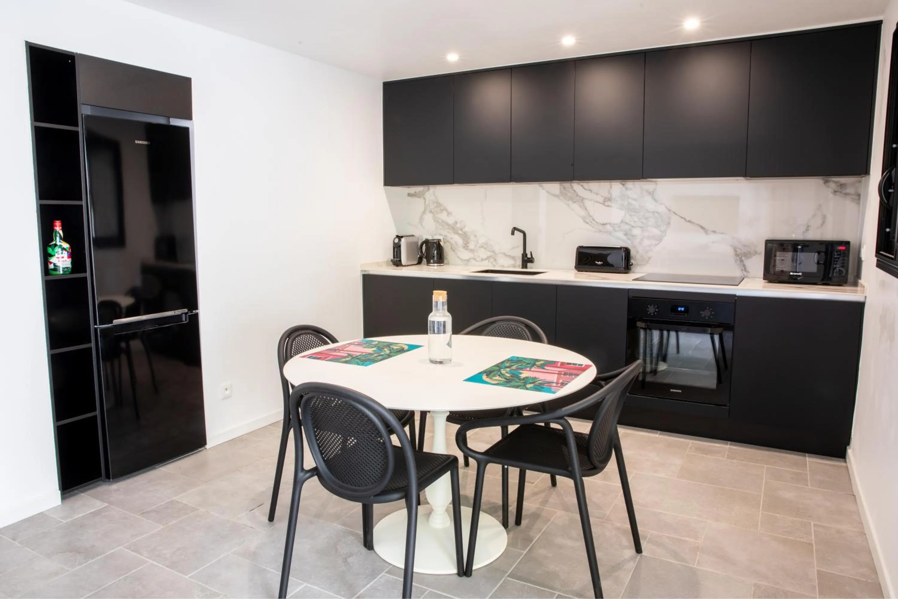 Kitchen or kitchenette in Domaine de la Palmeraie - Villas Lodge