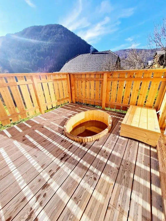 Hot Tub in Le Chalet Du Blanc Spa yoga