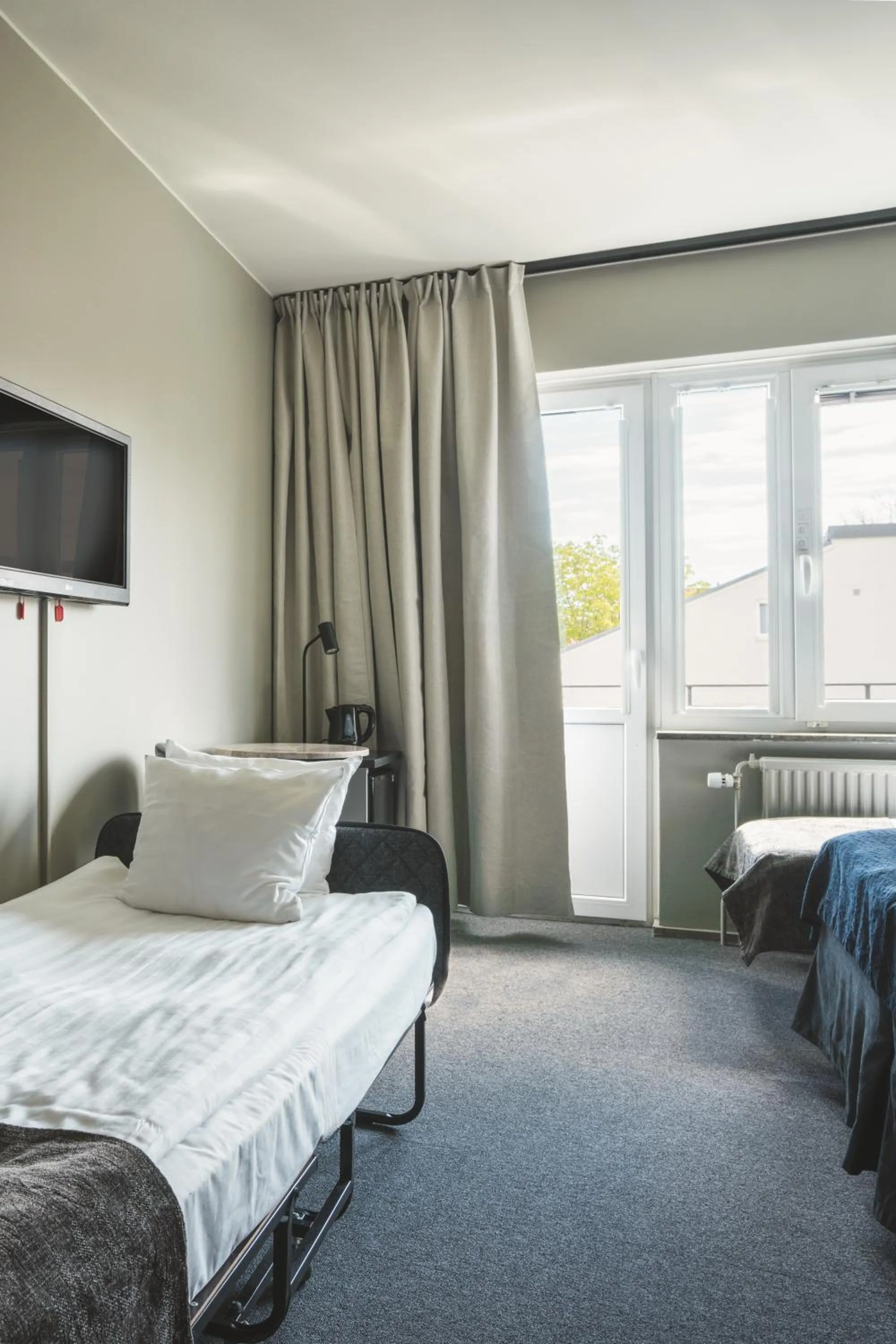 Bed in VICI Hotels Linköping