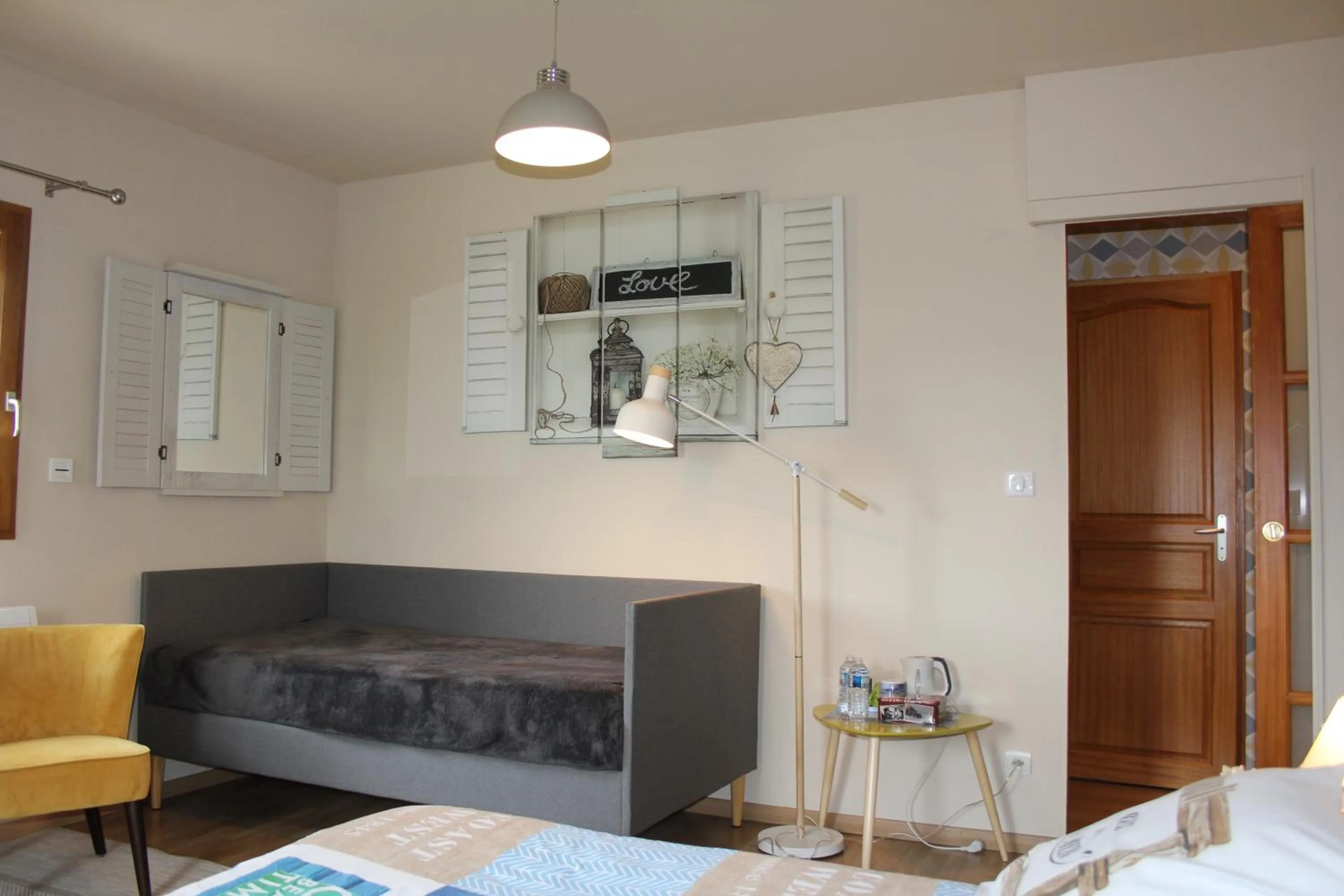 Bed in Chambre D'hotes Le Clos Fleuri