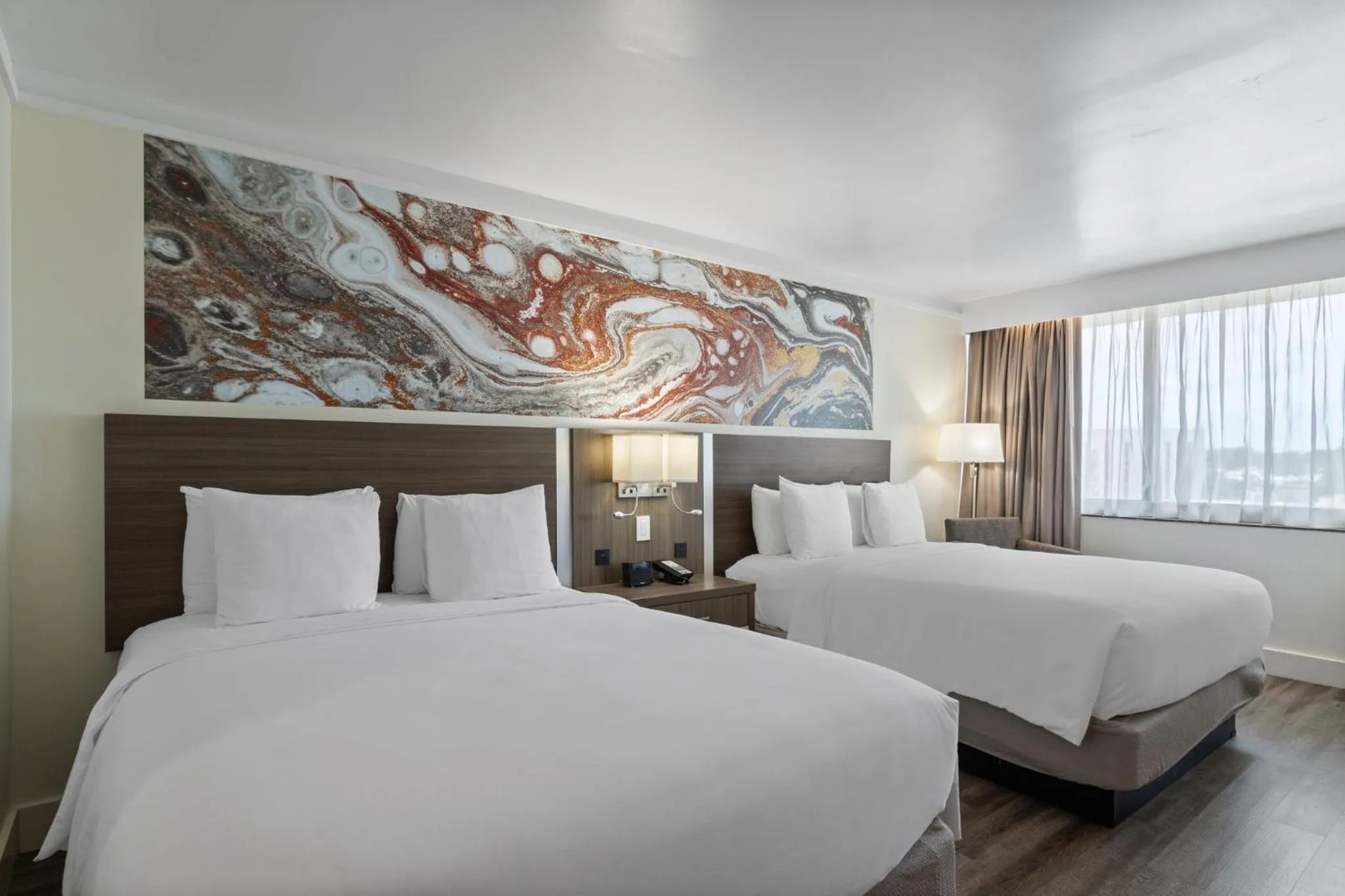 Photo of the whole room, Bed in Crowne Plaza Executive Center Baton Rouge by IHG